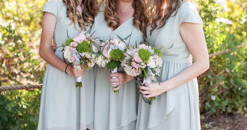 Bridesmaids - Picture shows bridesmaids and bride. This price would be for 1 Bridesmaids hand tied bouquet as pictured but we can customize to your color scheme and budget.