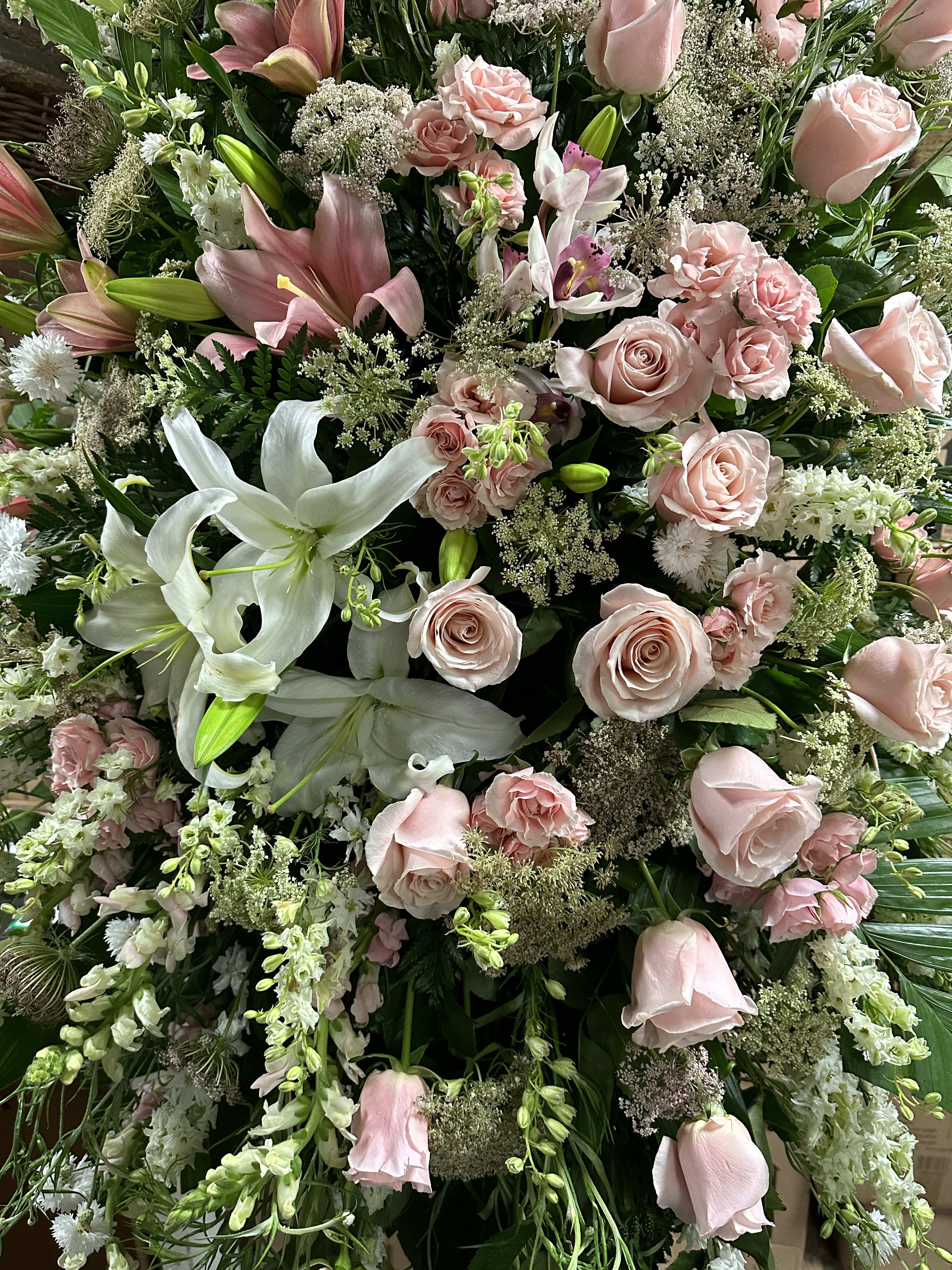 Pink tribute  - Standing spray of premium pink flowers. 