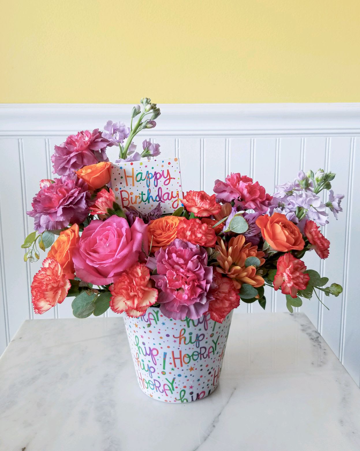 Hip Hip Hooray Bouquet - What a better say Happy Birthday with our Hip Hip Hooray Bouquet.  Designed in a white Melamine container shouting birthday cheer.  Team up with a box of chocolates or Birthday Balloon ! approx Dimensions 12 in X 13 in