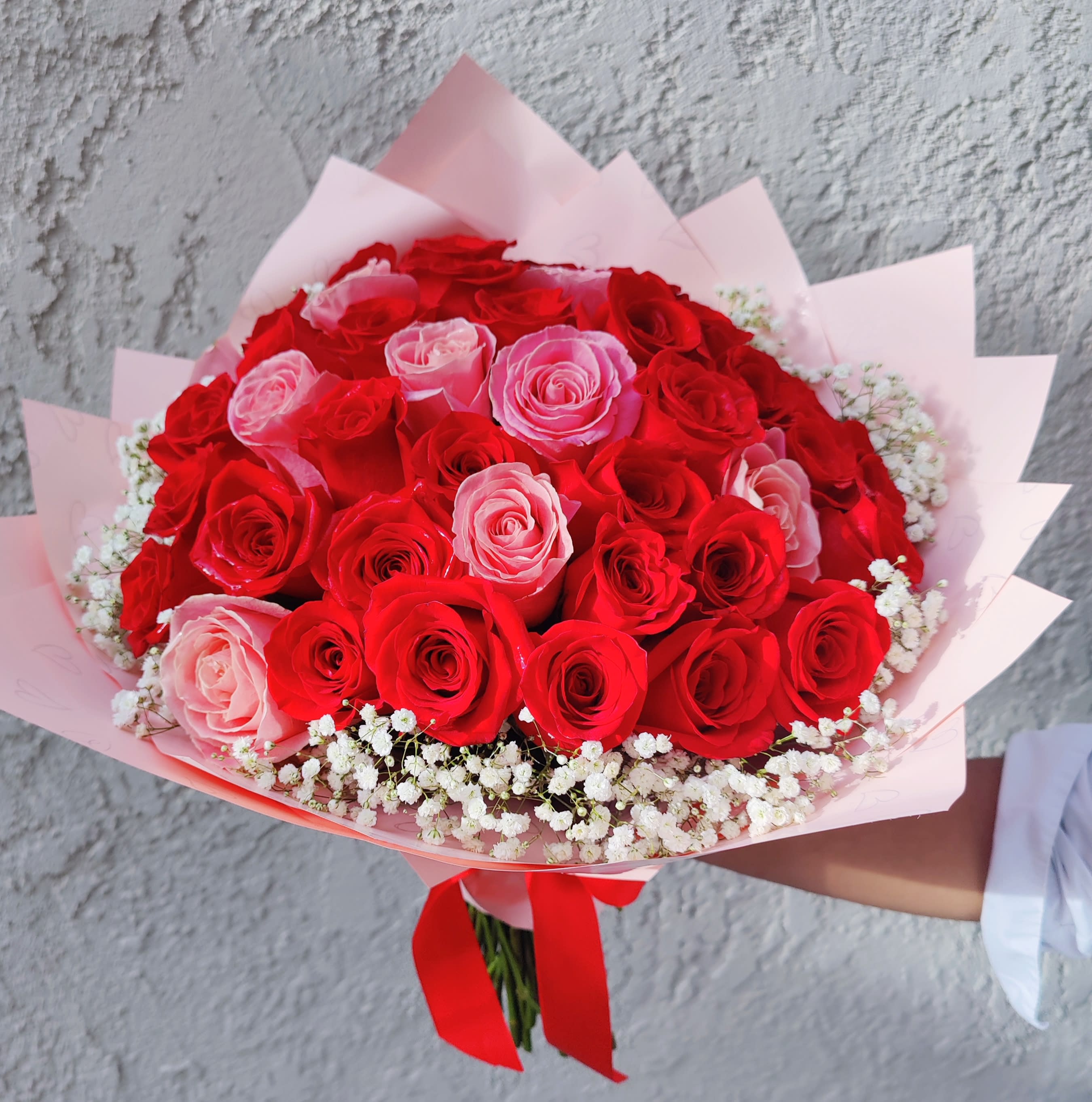 &quot;My Love&quot; 50 Roses Bouquet  - Beautiful bouquet created with 50 fresh roses in Pink and red tones. It's accented with seasonal white little flowers ( wax flower or baby breath flowers in white color) Premium roses. Long stem roses. It's the perfect gift to show your love. Large size  Round style  Standard Price includes 50 premium roses.( As shown in pictures)  