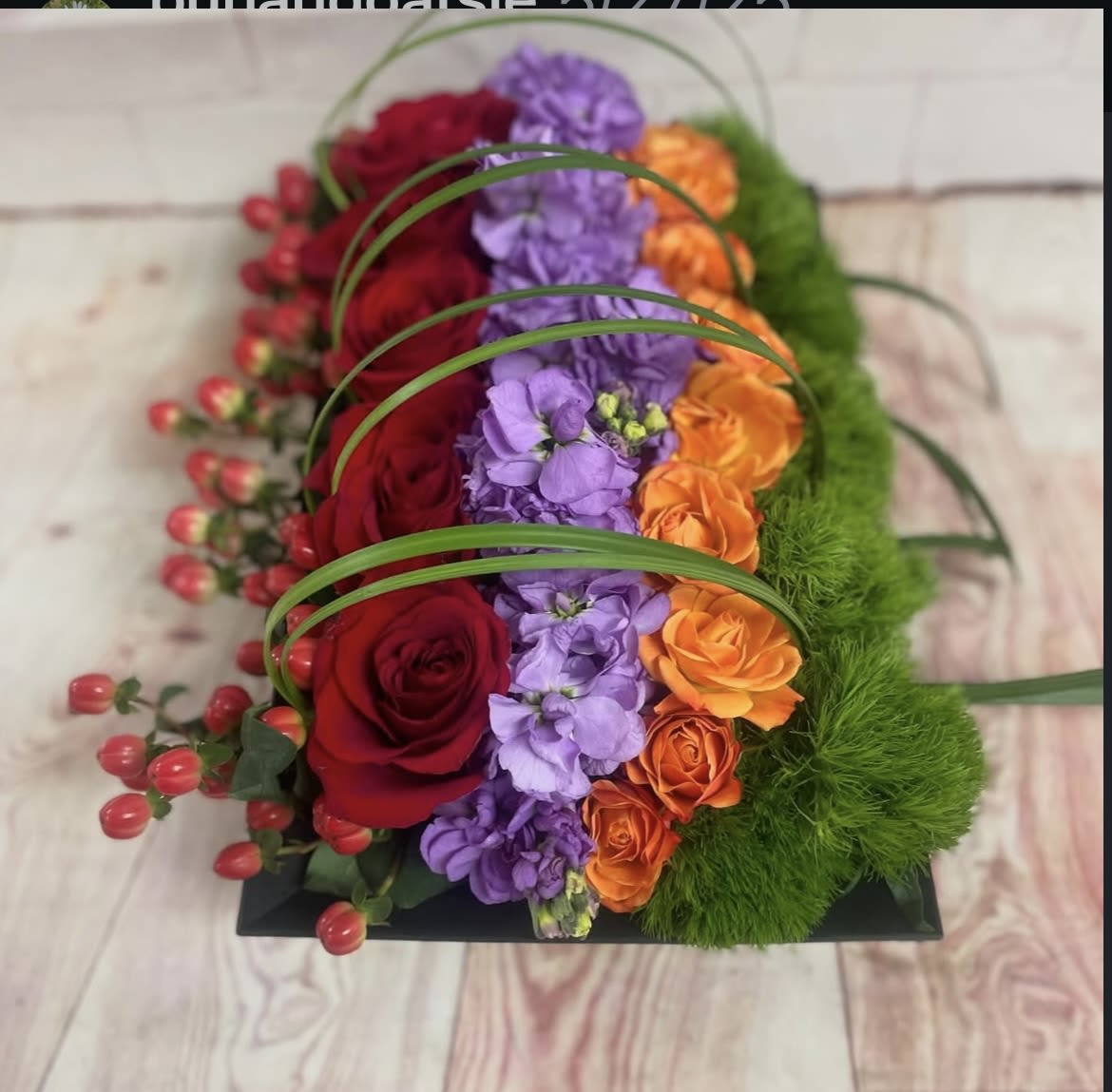 canopy of joy canopy of joy - modern design including red roses, dianthus , stock , hypericum, and lily grass as the canopy