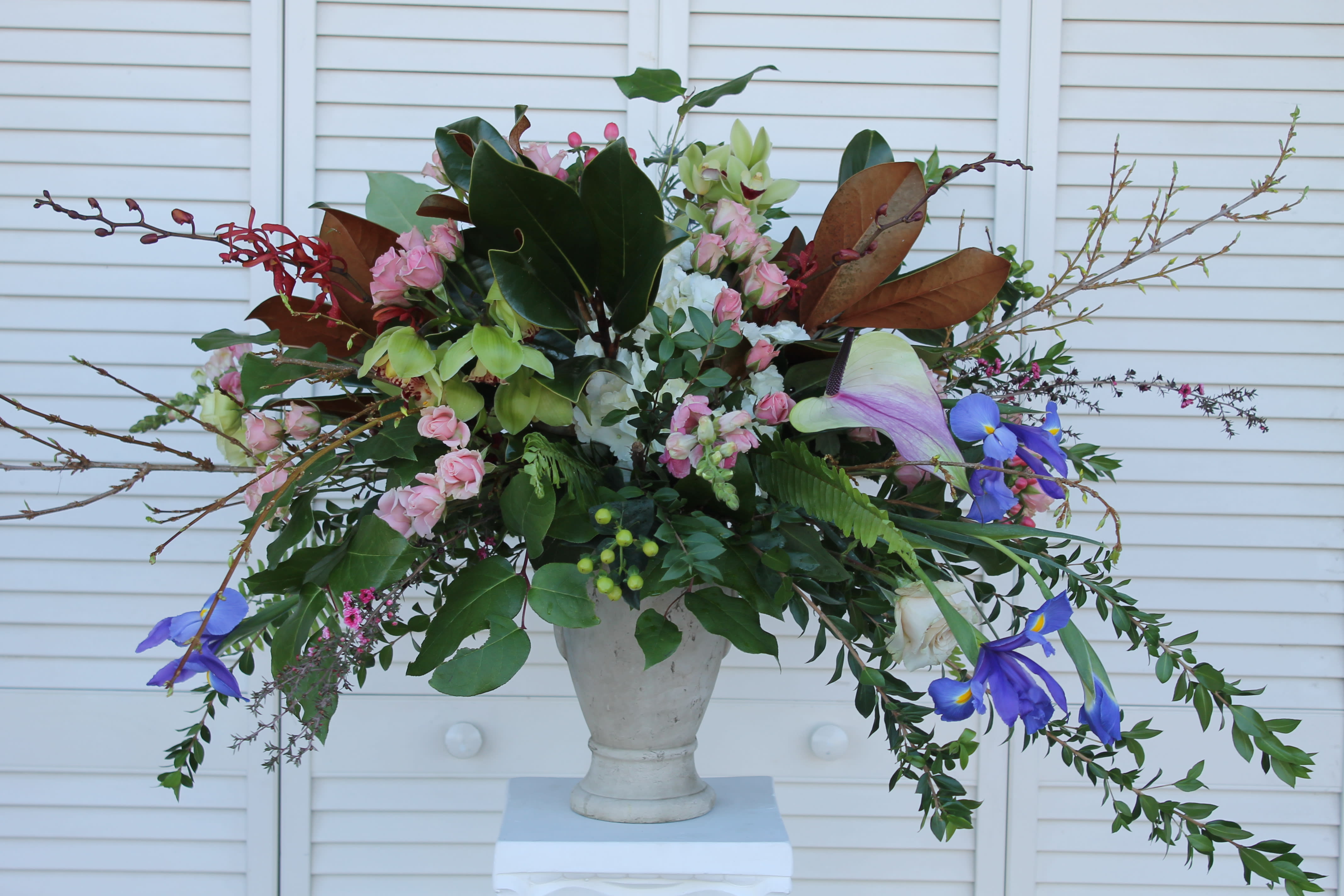 Graceful  - This graceful casket arrangement will celebrate a life well-lived.