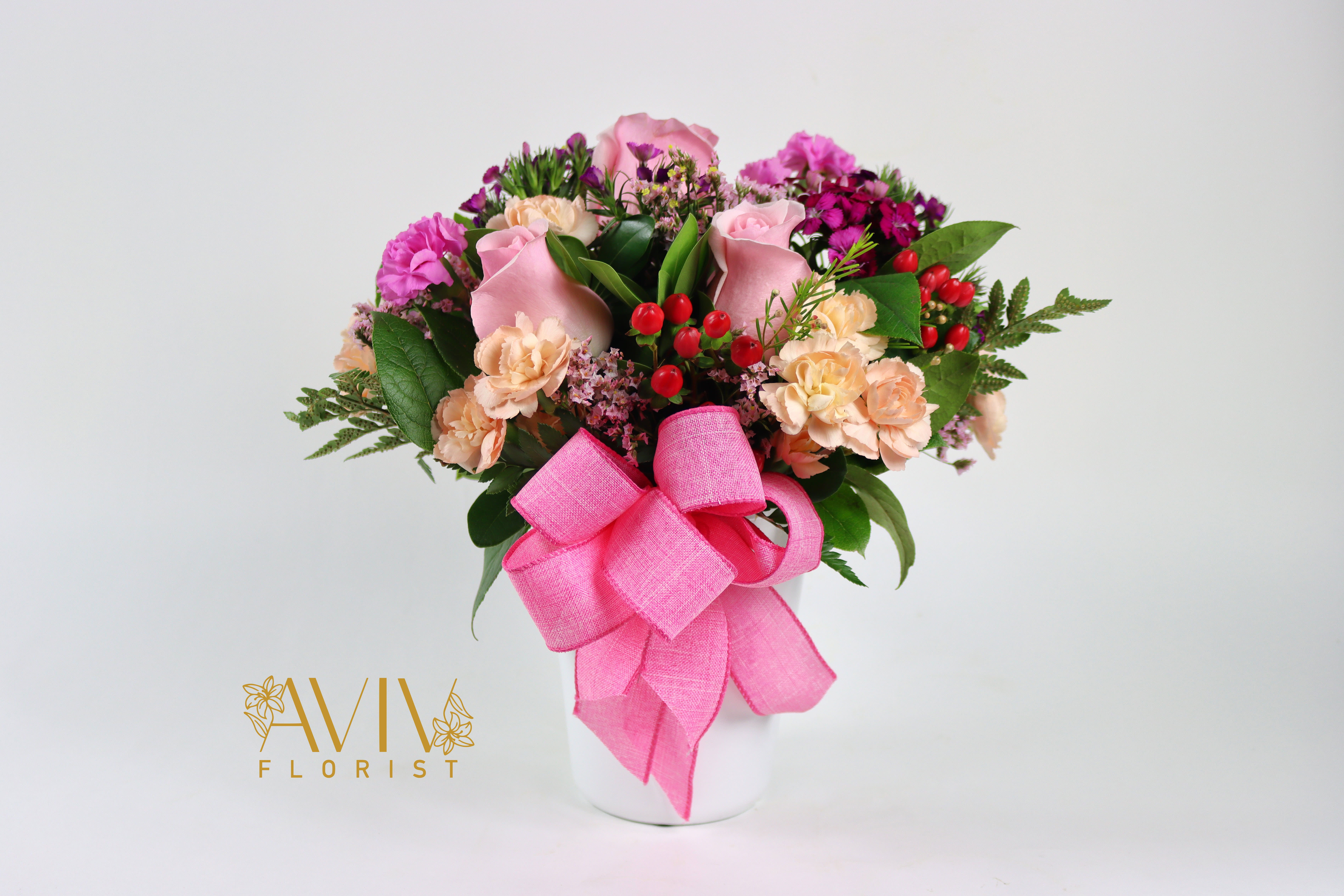 Sweet Aroma - This pretty arrangement is classically elegant in a way that will never go out of style; this fresh flower arrangement is truly a dream.