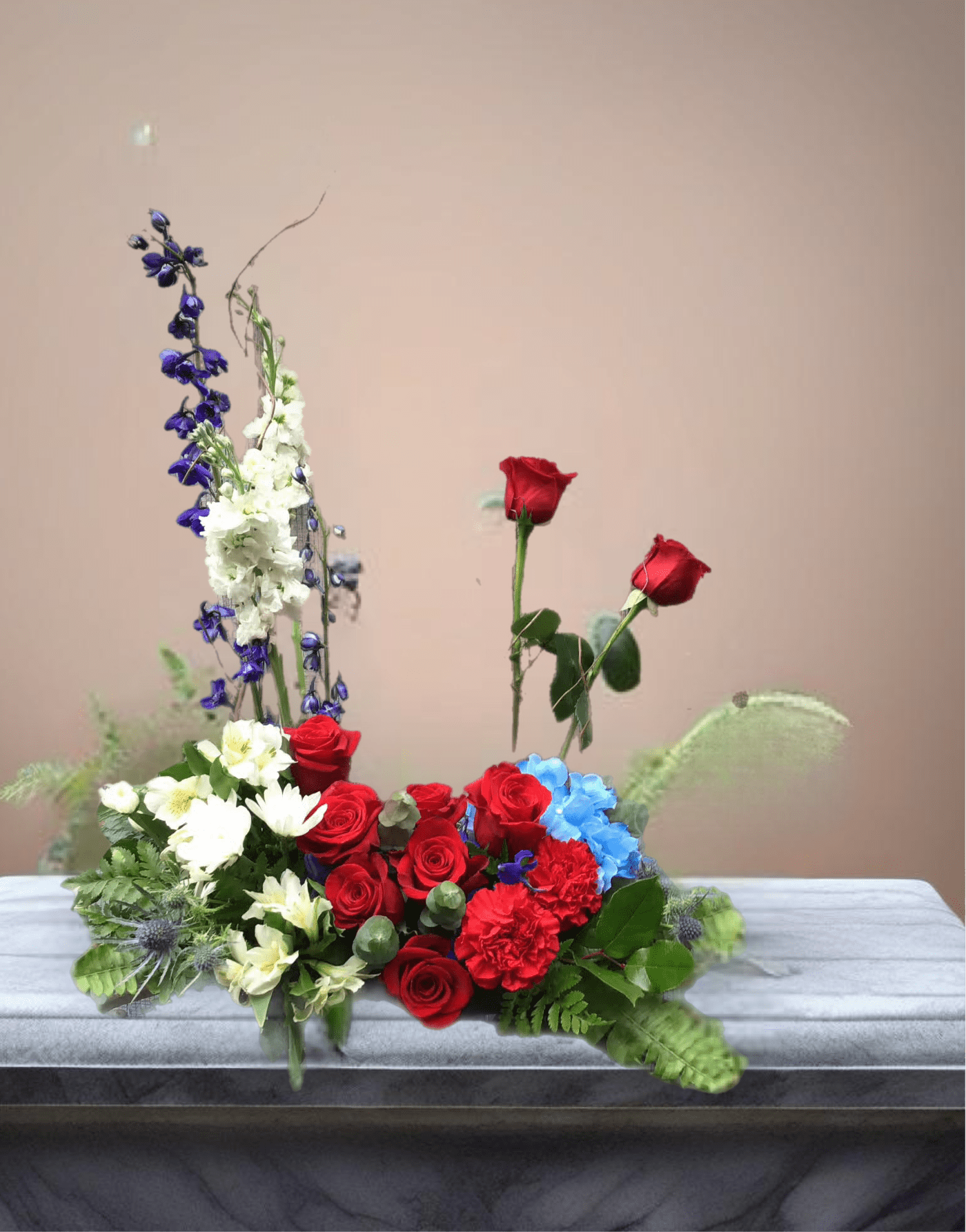 Always With Us Photo Tribute Bouquet - Surround a beloved picture with patriotic spirit with this gorgeous bouquet of blue hydrangea and red and white roses. ***Frame &amp; picture not included.