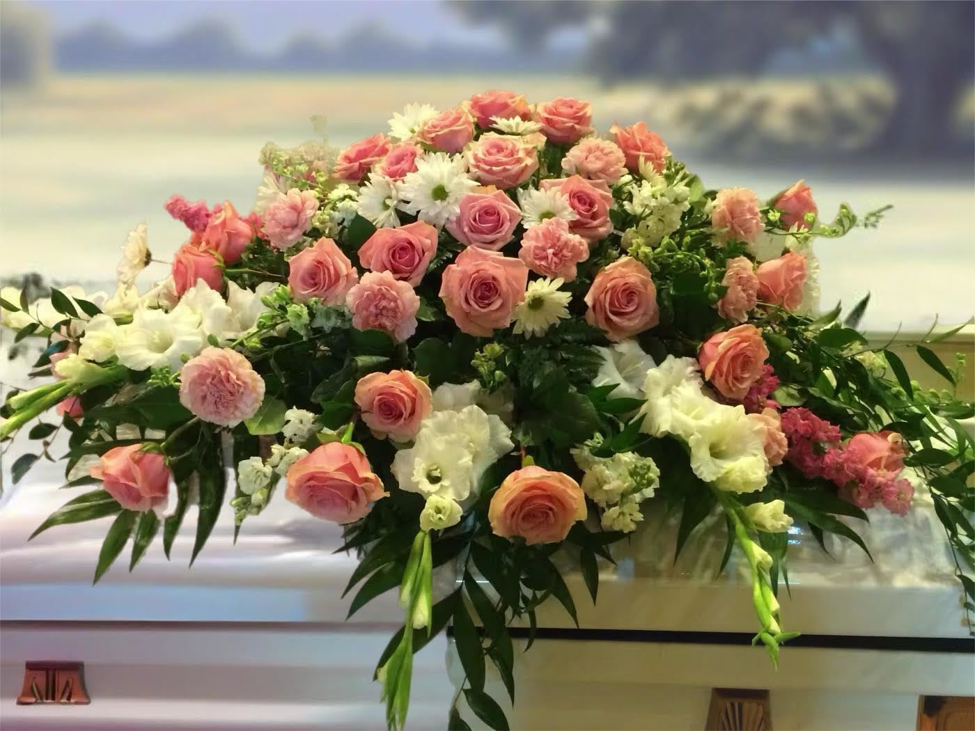 Peach & White Casket Spray Peach & White Casket Spray - Peach & white roses, stock, gladiolas, carnations & daisies arranged beautifully for your loved one.