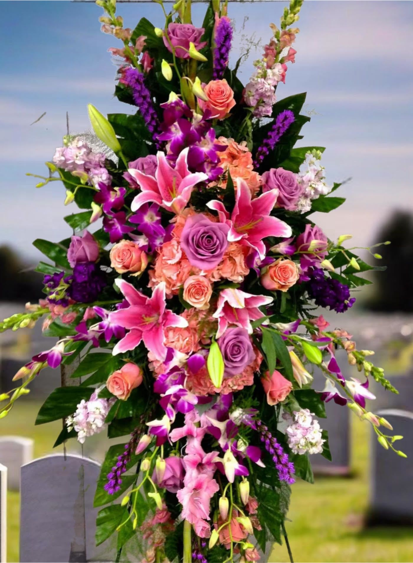 Amethyst Amethyst - Pay tribute to a vibrant soul by choosing a rich mix of jeweled tone flowers.
