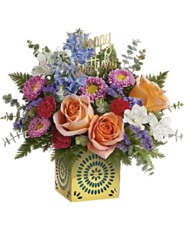 Best Wishes Best Wishes - Send a rainbow of best wishes on any occasion with this glorious rose bouquet in a shimmering golden metal cube with delicate lace cutouts. Peach roses, white alstroemeria, miniature hot pink carnations, light blue delphinium and pink matsumoto asters are arranged with purple sinuata statice, spiral eucalyptus and leatherleaf fern. Delivered in Teleflora's Celebrate in Style Cube.