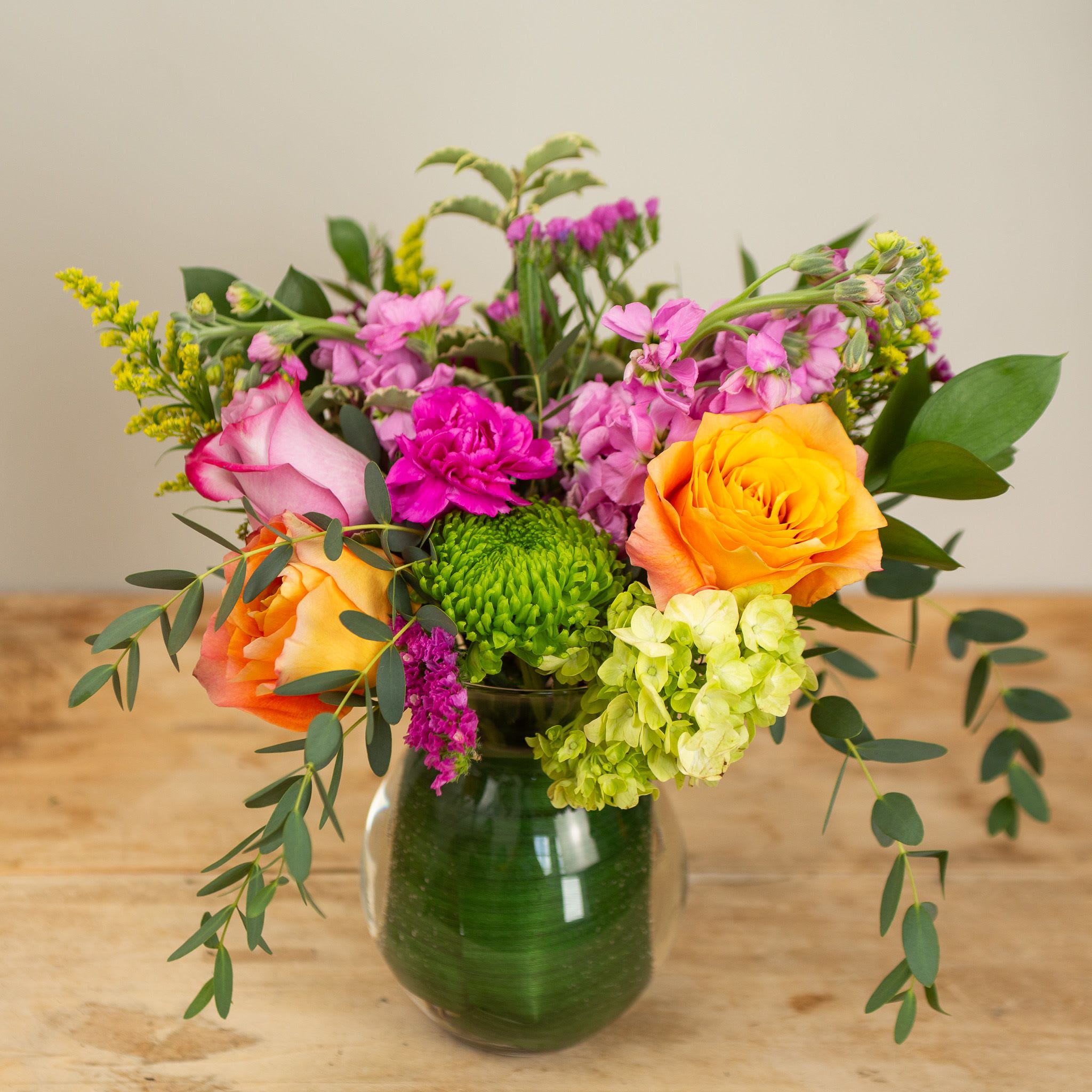 Designer's Choice Arrangement - Let us create an arrangement of our favorite flowers of the day! Color palette and flower choice will vary depending on season and availability. Designer's choice is our favorite way to create for you! Standard size: 8x8 Deluxe size: 10x10 Premium size: 12x12