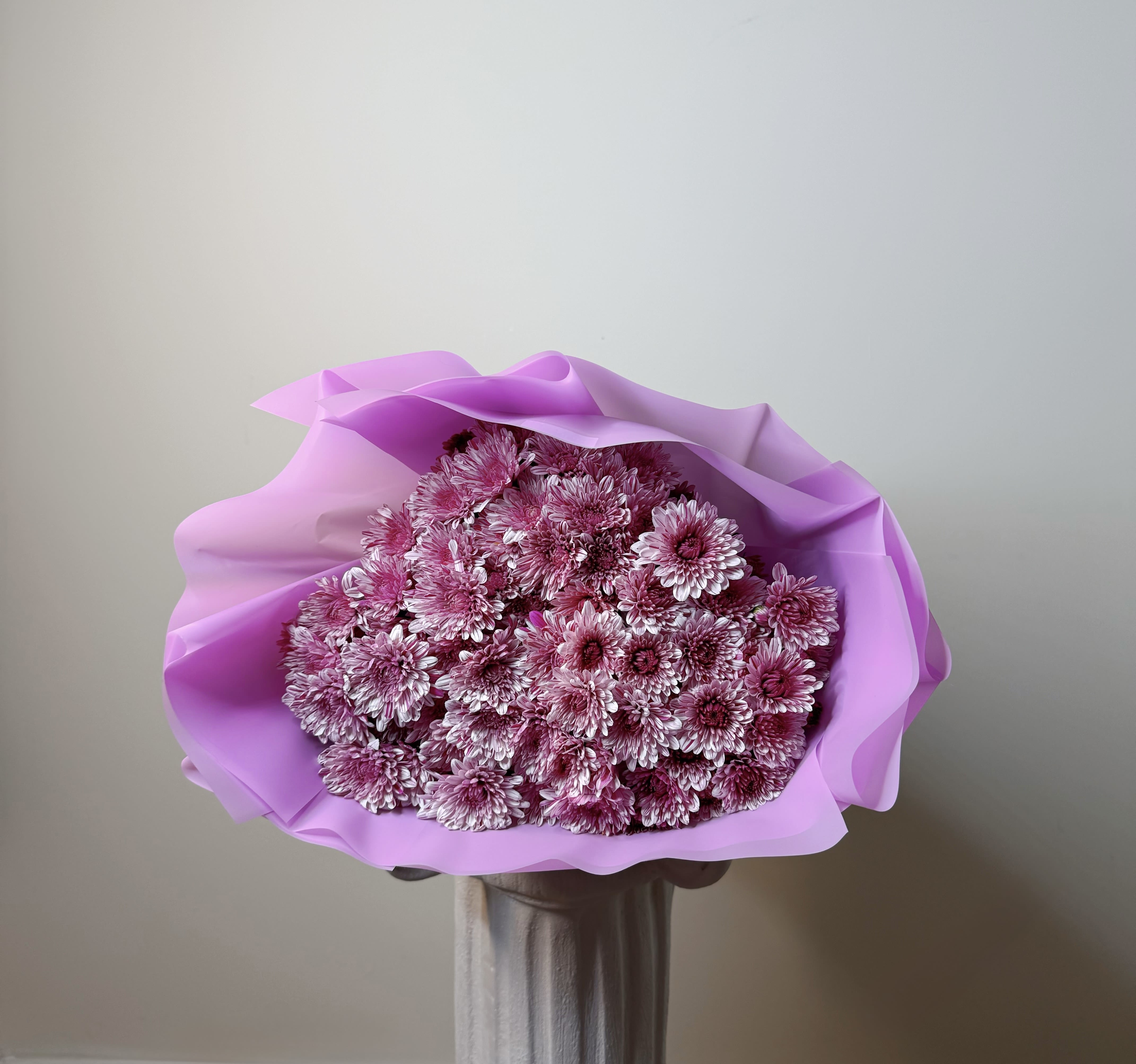 Purple Bouquet - There’s something about it you can’t quite explain but you feel it. Each bloom seems to open with intention, as if it knows it’s being seen. A bouquet that doesn’t try to impress, but does naturally.
