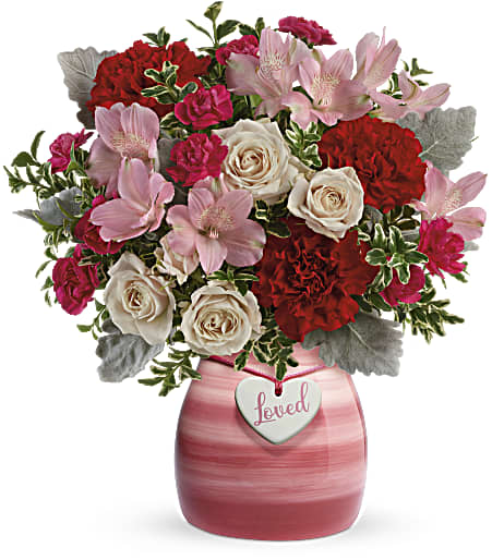 Painted In Love Bouquet - A beautiful bouquet of roses, alstroemieria, carnations and greenery.  Crème spray roses, pink alstroemeria, red carnations, and hot pink miniature carnations are arranged with dusty miller and oregonia. Delivered in a Playfully Pink vase. Approximately 13&quot; W x 14&quot; H