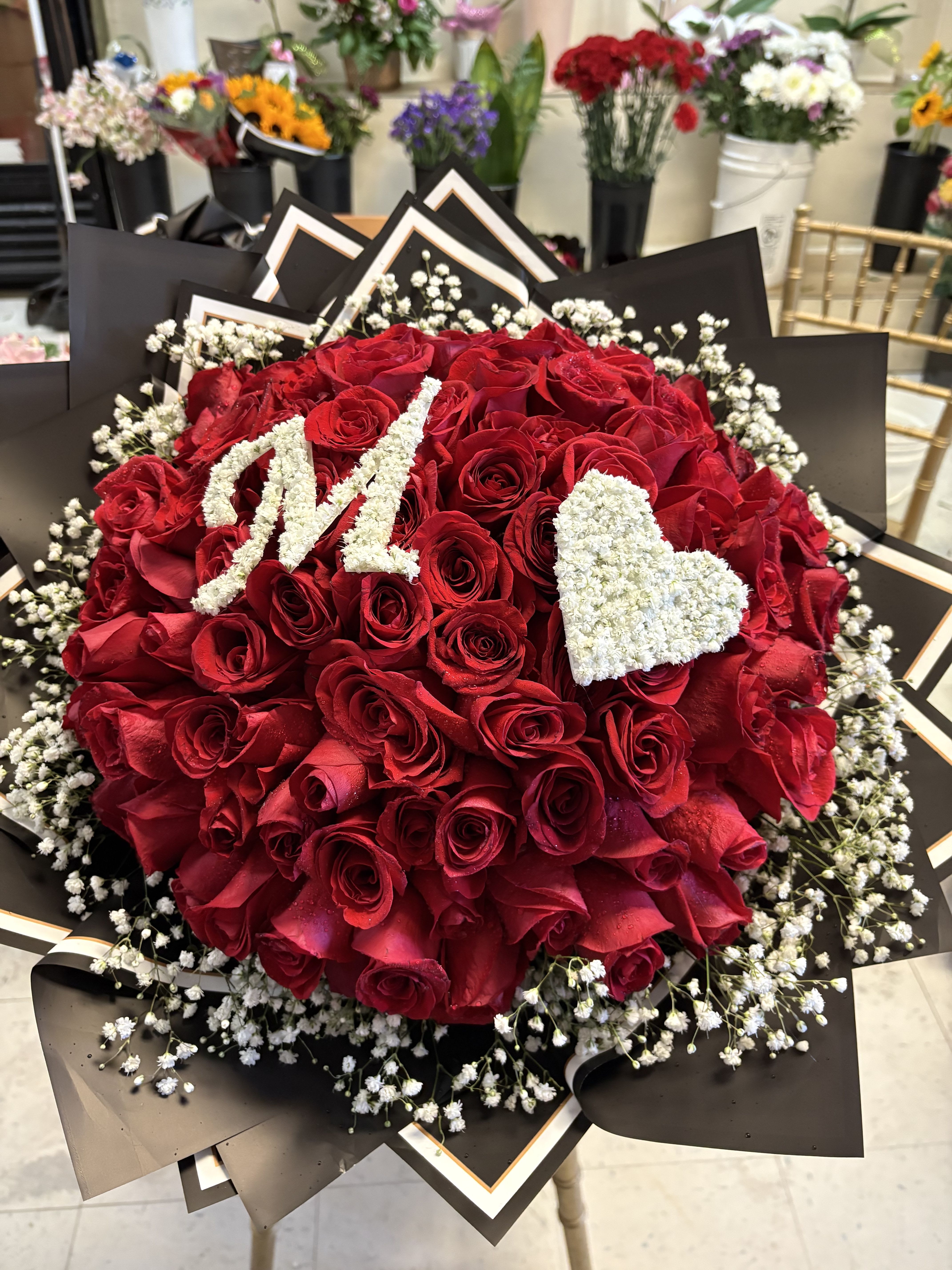 100 Roses Personalized Letter - 100 Red Roses with Personalized Letter and heart Color paper of choice. 