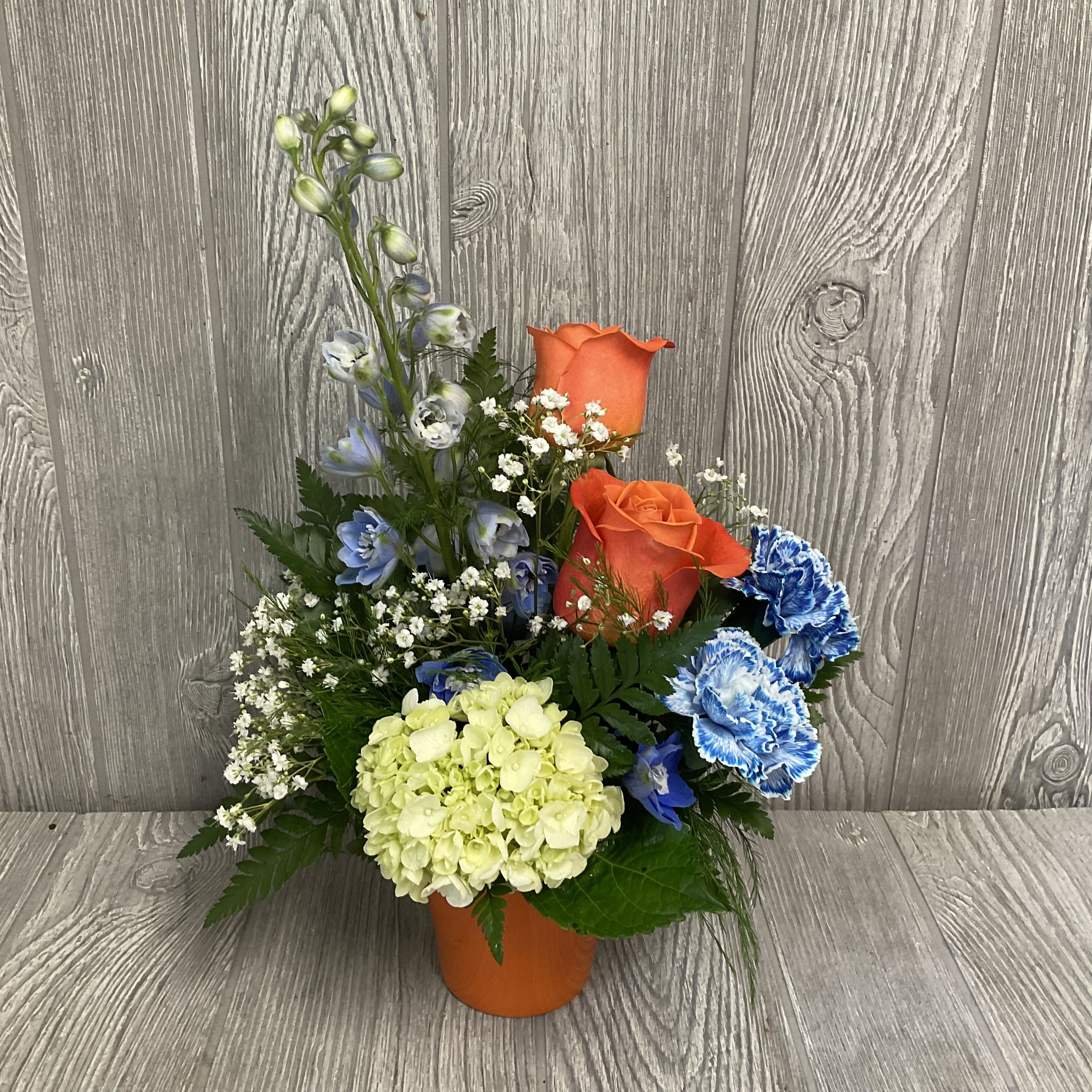 Welcome to the Swamp - Show your Gator pride with fresh cut flowers in this petite modern arrangement. Flowers may vary. 