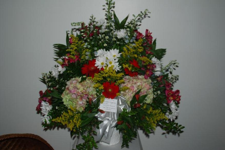 Condolences Bouquet Condolences Bouquet - Send this beautiful condolences bouquet to the home or funeral.