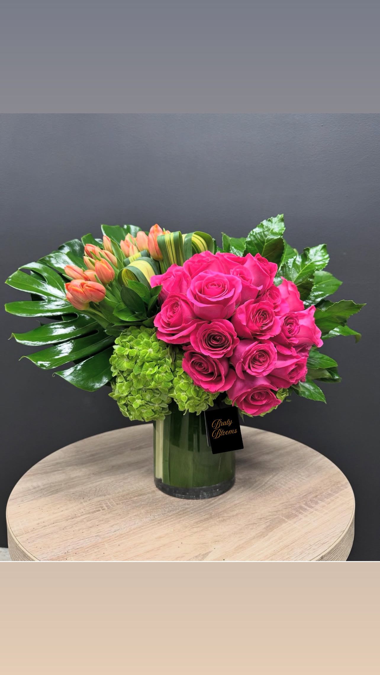 Coral &amp; Fuchsia - &quot;Coral &amp; Fuchsia&quot; is a stylish and modern arrangement that showcases the beauty of contrasting colors.  The unexpected pairing of fuchsia roses and orange tulips creates a chic and sophisticated design, perfect for adding a touch of contemporary flair to any space.  *please allow 72 hours for delivery due to custom tulip color, you may still order  and we can substitute. 