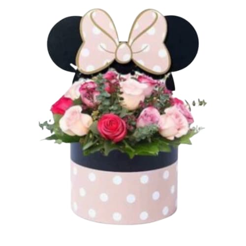 Minnie's Rose Garden - Get ready for a burst of Disney magic with our &quot;Minnie's Rose Garden&quot; arrangement!  A variety of pink roses create a captivating display within a specially designed Minnie Mouse box featuring signature ears.  This enchanting floral tribute is perfect for birthdays, anniversaries, or simply surprising a loved one with a touch of Disney wonder and undeniable charm.  This product is an independently created design inspired by Minnie Mouse.  It is not affiliated with, endorsed by, or sponsored by The Walt Disney Company or any of its related entities.  *pink rose shades and greenery may vary depending on seasonal availability. 