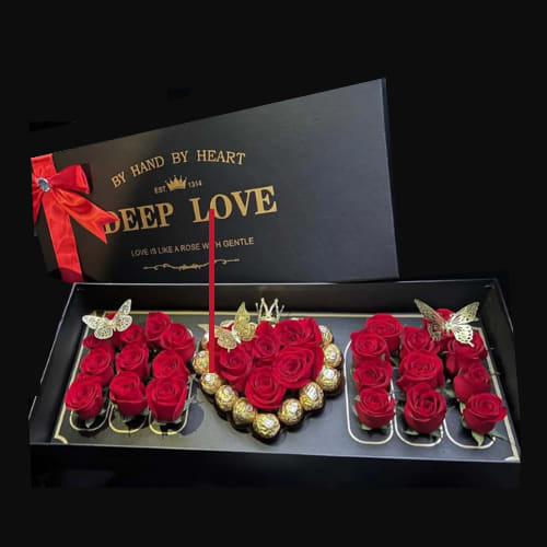 Mom's Sweetest Gift  - Show your appreciation for the world's best Mom with &quot;Mom's Sweetest Gift.&quot; This heartfelt present features a beautiful arrangement spelling out &quot;MOM&quot; in vibrant red roses, complemented by a selection of delectable Ferrero Rocher chocolates.  A perfect combination of sweetness and sentiment to celebrate your amazing mother.