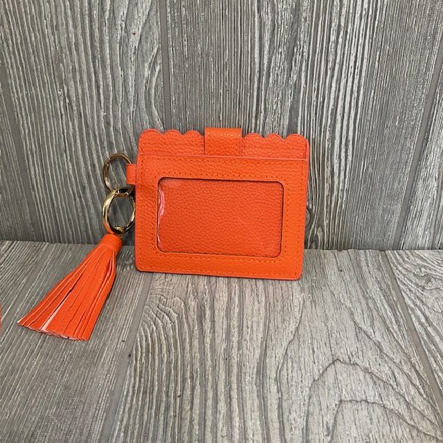 Orange Wallet - Cute orange wallet with an ID holder and two slots for cards and dollar bills. 