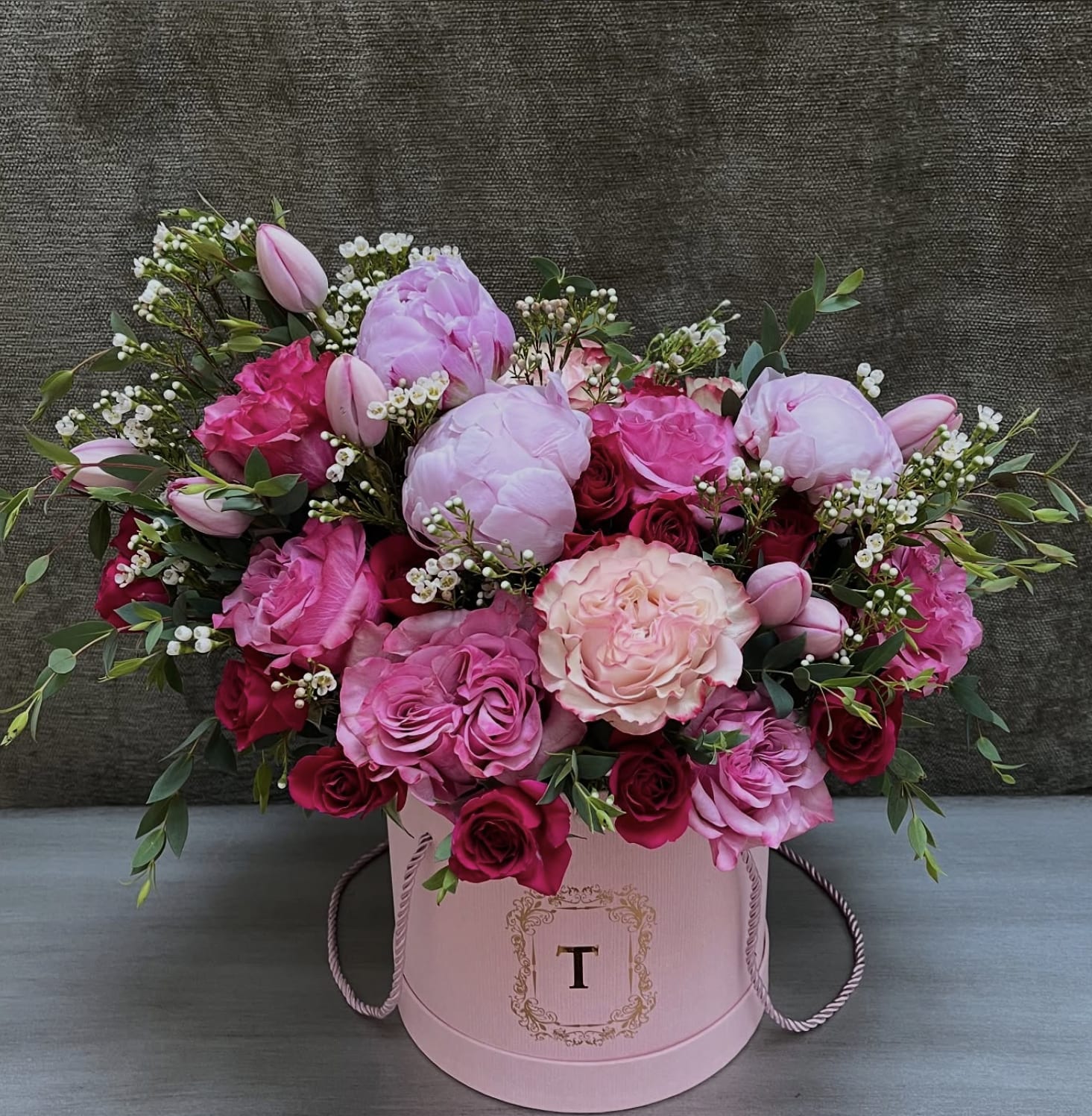 Spring Sonata Bouquet - Celebrate the beauty of spring with our “Spring Sonata Bouquet.” This enchanting arrangement brings together the timeless charm of roses, the lush elegance of peonies, and the vibrant freshness of tulips. Each bloom is carefully selected in soft, seasonal hues to create a harmonious blend of color and texture. Presented in a graceful gathering, this bouquet radiates warmth and joy—making it the perfect centerpiece or gift to brighten any springtime occasion. Let the delicate fragrance and vivid blooms lift spirits and welcome the new season in style.