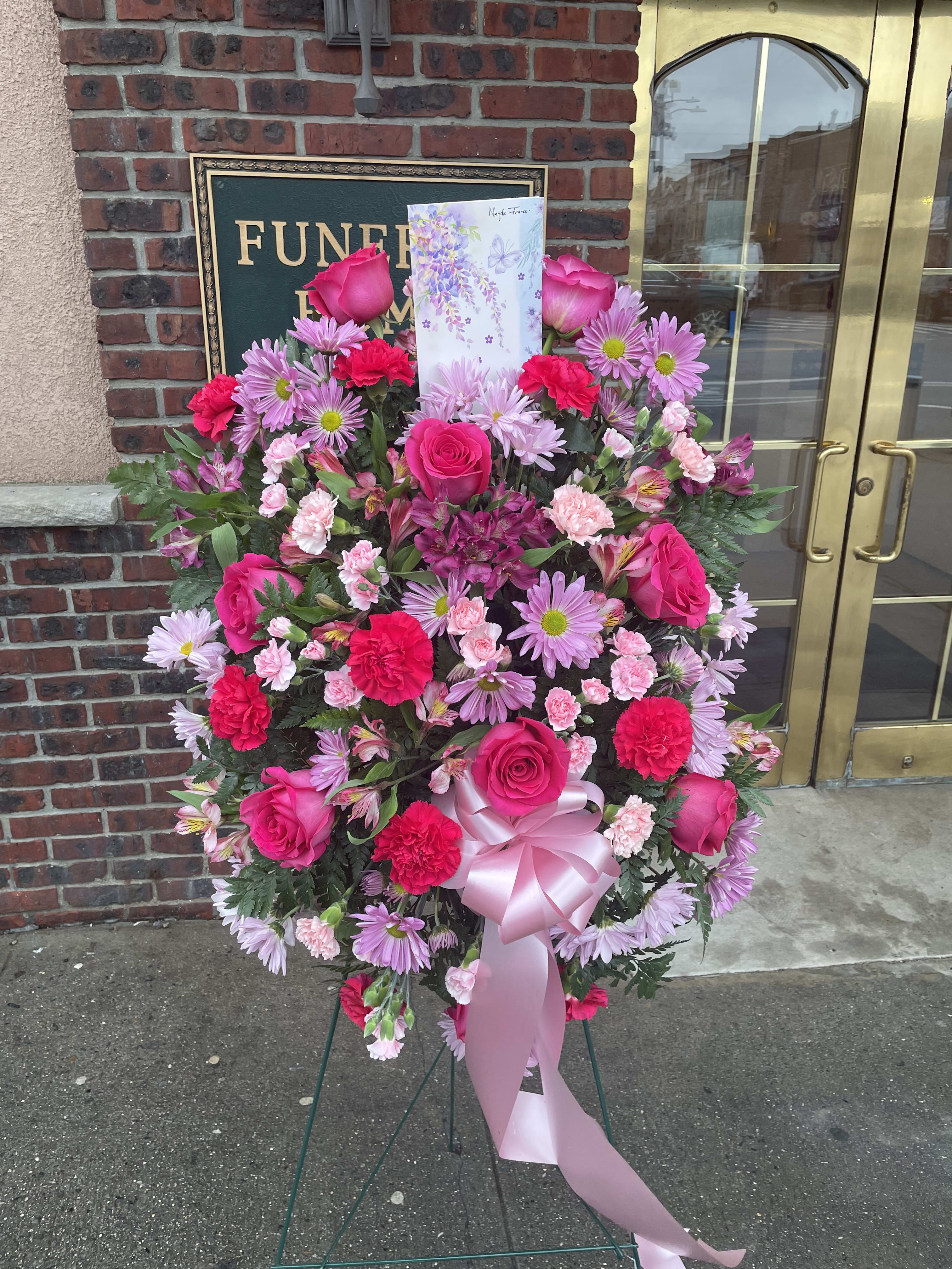 Pink Goodbye - Glorify a life well-lived with this magnificent spray of pink flowers--a radiant, reflective celebration of her beauty and love.