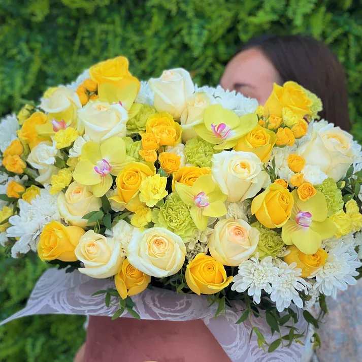 #16 Elegance - Amazing composition of beautiful yellow, green and white and many more bright blooms  Seasonal or not available flowers can be replaced with a similar one. Boxes and baskets can also be replaced with others