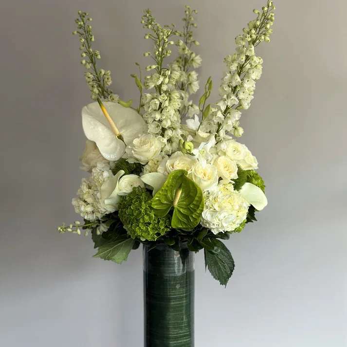 #30 Unique - Exquisite and luxurious arrangement that will enchant anyone shown an actual size &quot;Standard&quot;  Seasonal or not available flowers can be replaced with a similar one. Vases can also be replaced with others
