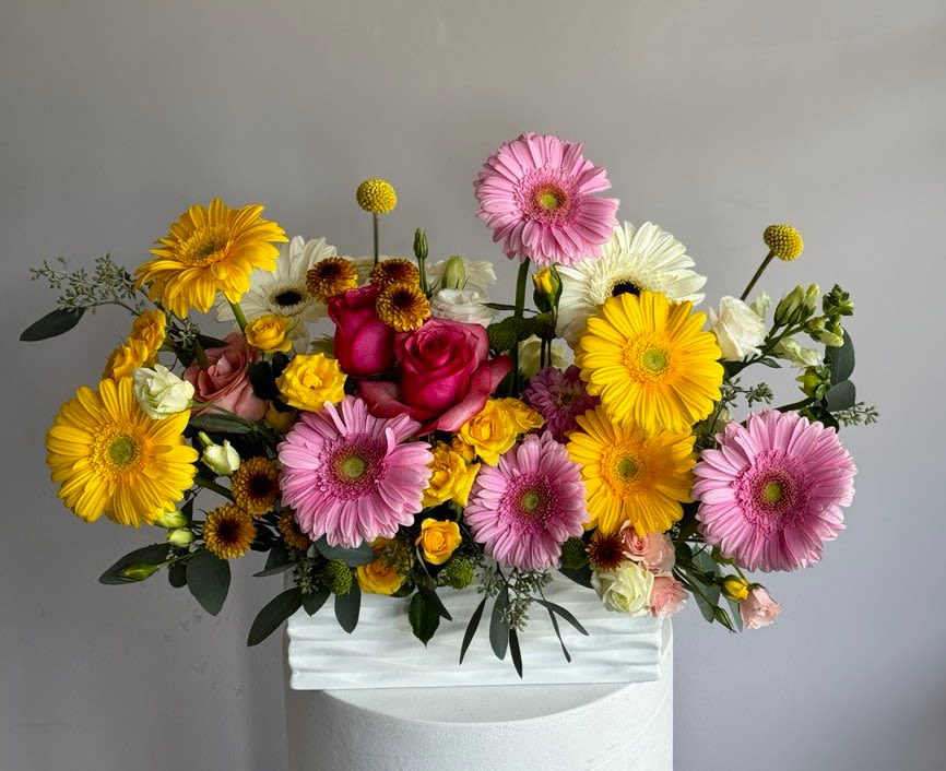 #24 Spring LUX - Spring LUX bursts with radiant energy, blending bold color contrasts and lush textures into a show-stopping floral experience. Designed for those who love to stand out, this bouquet captures the essence of springtime celebration — full of life, color, and flair.  -Seasonal or not available flowers can be replaced with a similar one. Vases and Pots can also be replaced with others