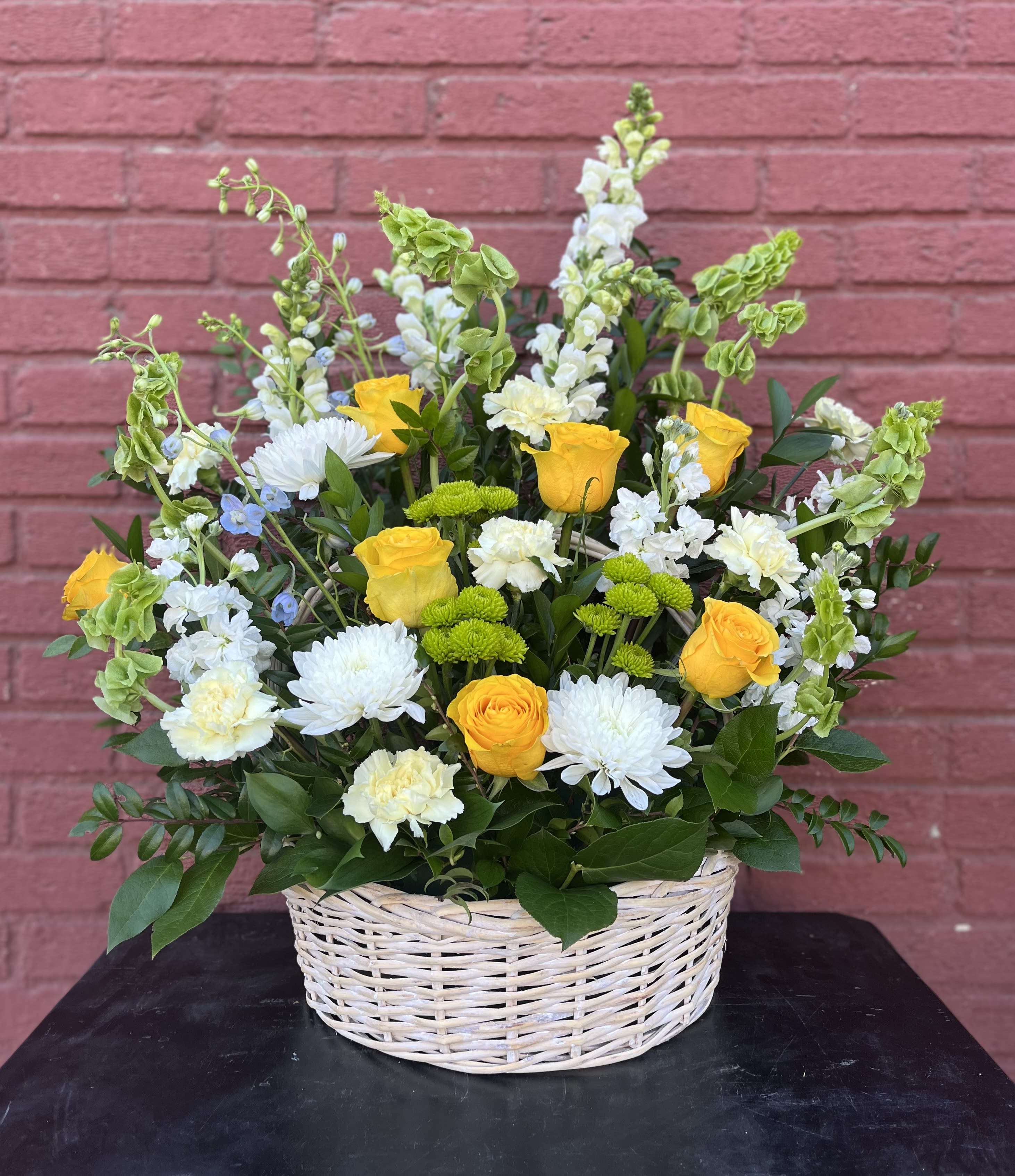 Large Sympathy Basket - This sympathy arrangement can be customized to match your desired color and flower choices. Please specify if you would like certain colors or a designer's choice.