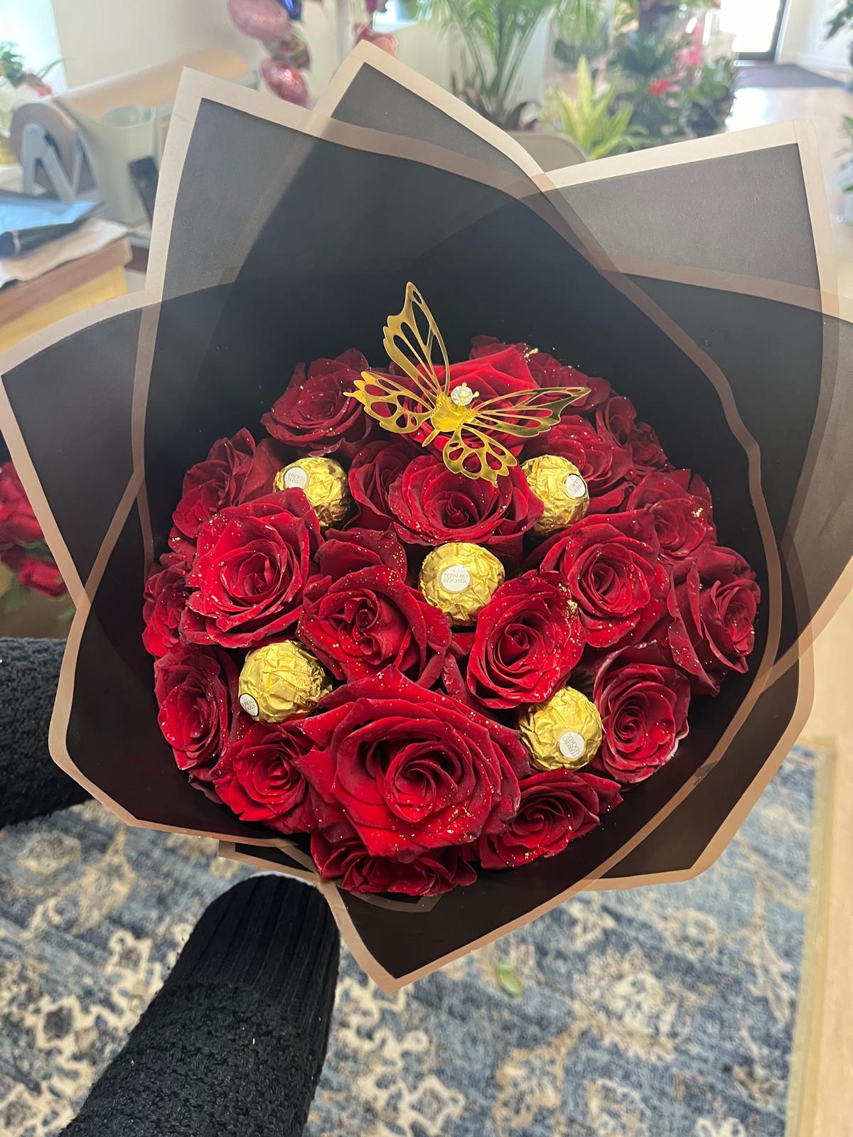 Red Roses with Chocolates Bouquet Red Roses with Chocolates Bouquet - 24 red roses, gold glitters, gold butterfly and 5 ferrero rocher chocolates