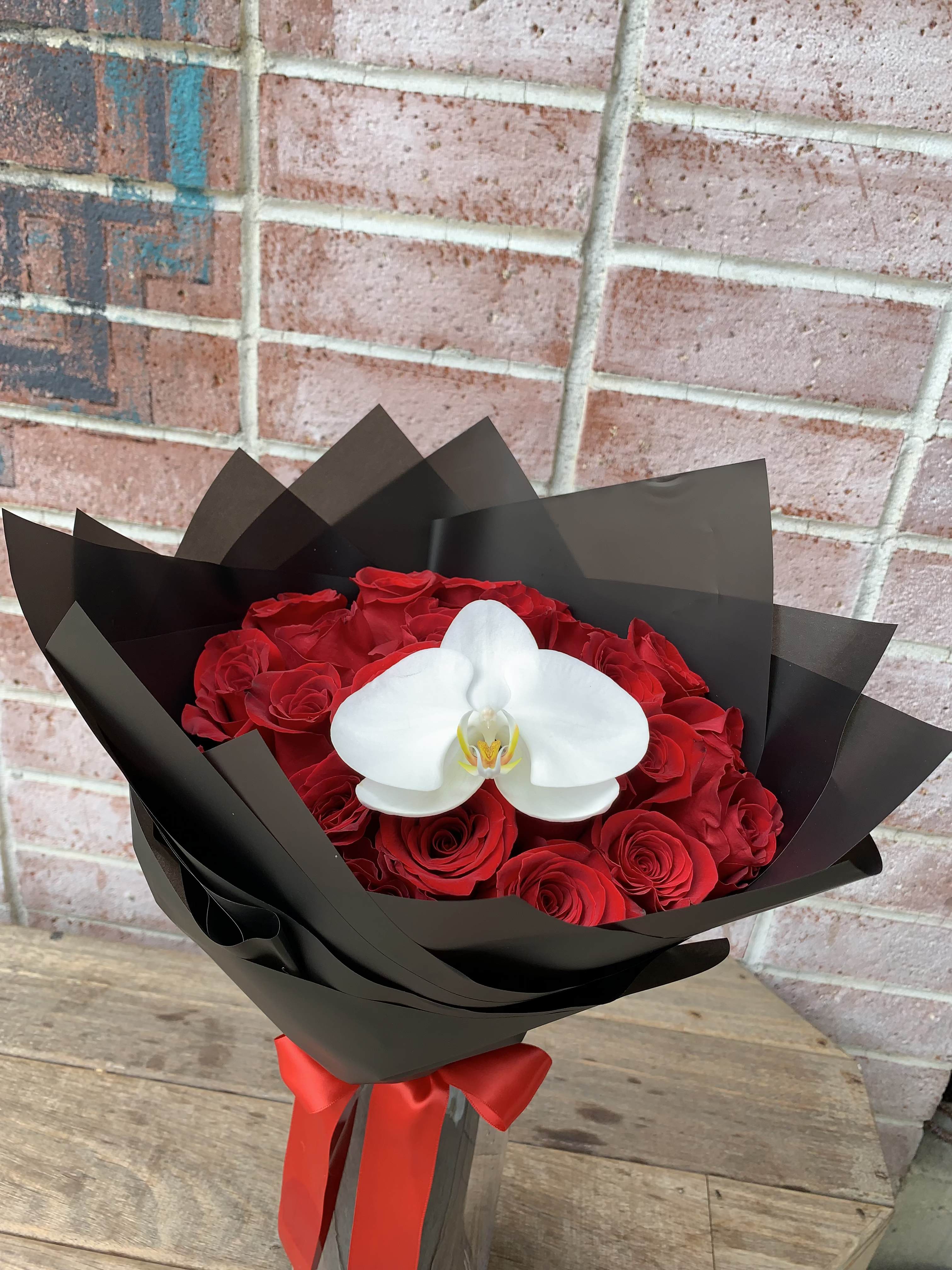 Red Romance Bouquet - 2 Dz of long red roses with one bloom orchid wrap in black Korean papers