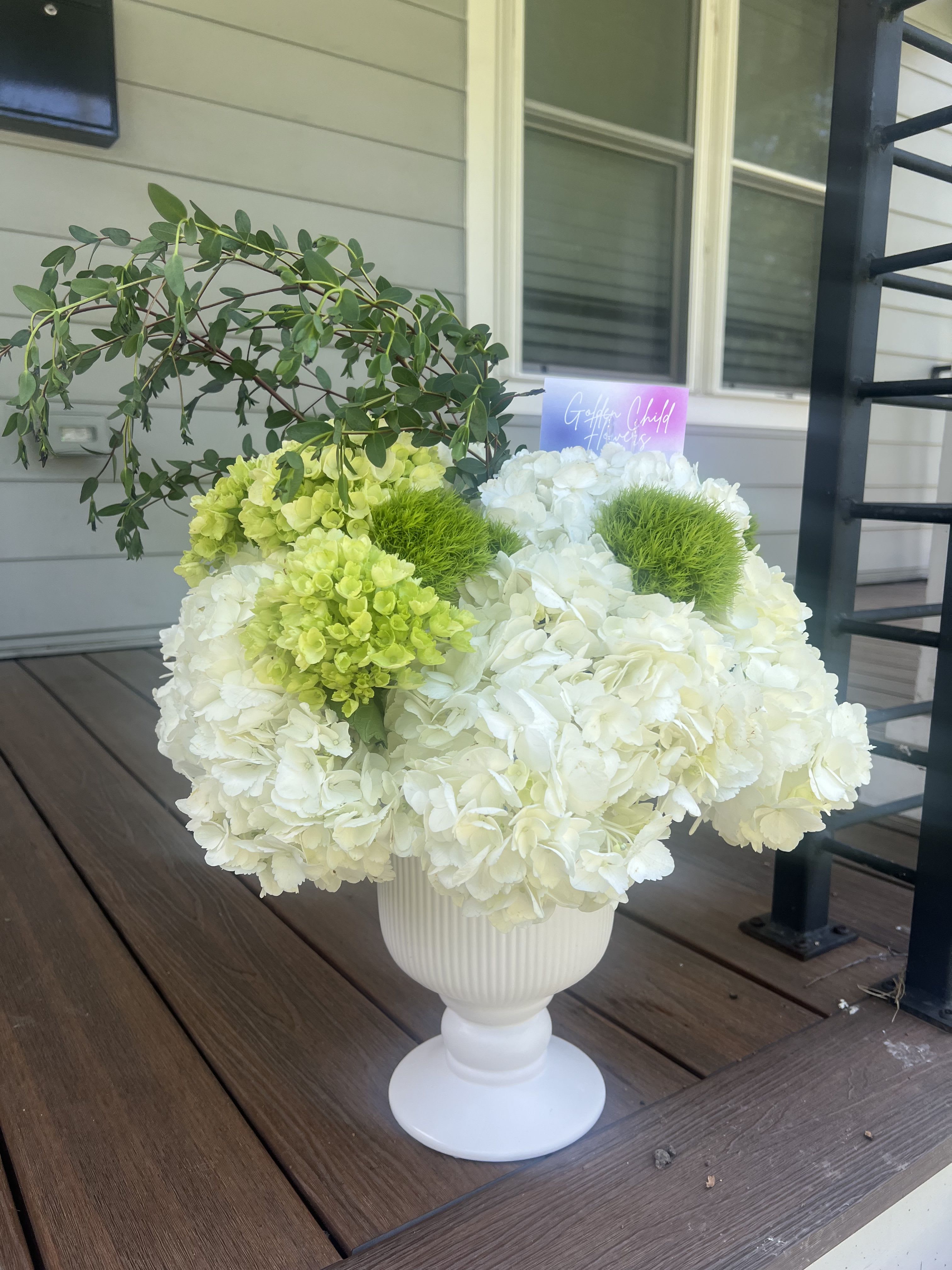 Lush Serenity Lush Serenity - A refreshing blend of white hydrangeas, green poms, green hydrangeas, and cascading fresh eucalyptus — perfect for a serene and elegant touch