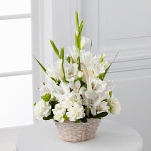 The FTD® Eternal Affection™ Arrangement The FTD® Eternal Affection™ Arrangement - The FTD® Eternal Affection™ Arrangement is a peaceful offering of heartfelt sympathy. White gladiolus, Peruvian lilies, carnations, mini carnations and lush greens are beautifully arranged in a round whitewash handled basket to create a beautiful display of soft serenity.
