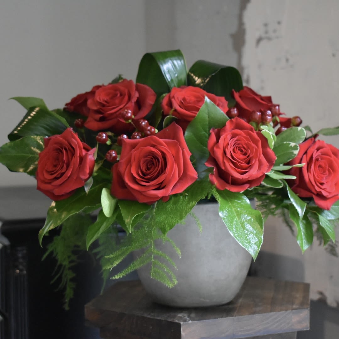 The Modern Dozen - Each arrangement is custom designed, using seasonal, best-of-day blooms. The image shown represents its size, style and temperament, however certain flowers may be substituted to achieve the best quality and longevity for your florals.