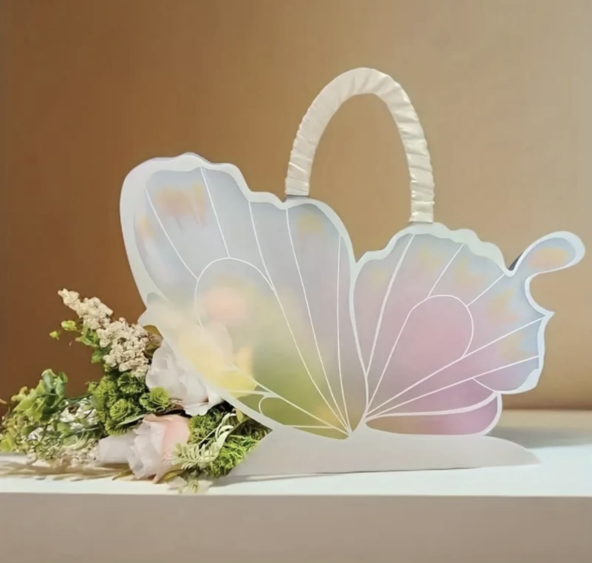 Butterfly Dreams bouquet  - Designers choice mixed floral bouquet elegantly displayed in our butterfly carrier 