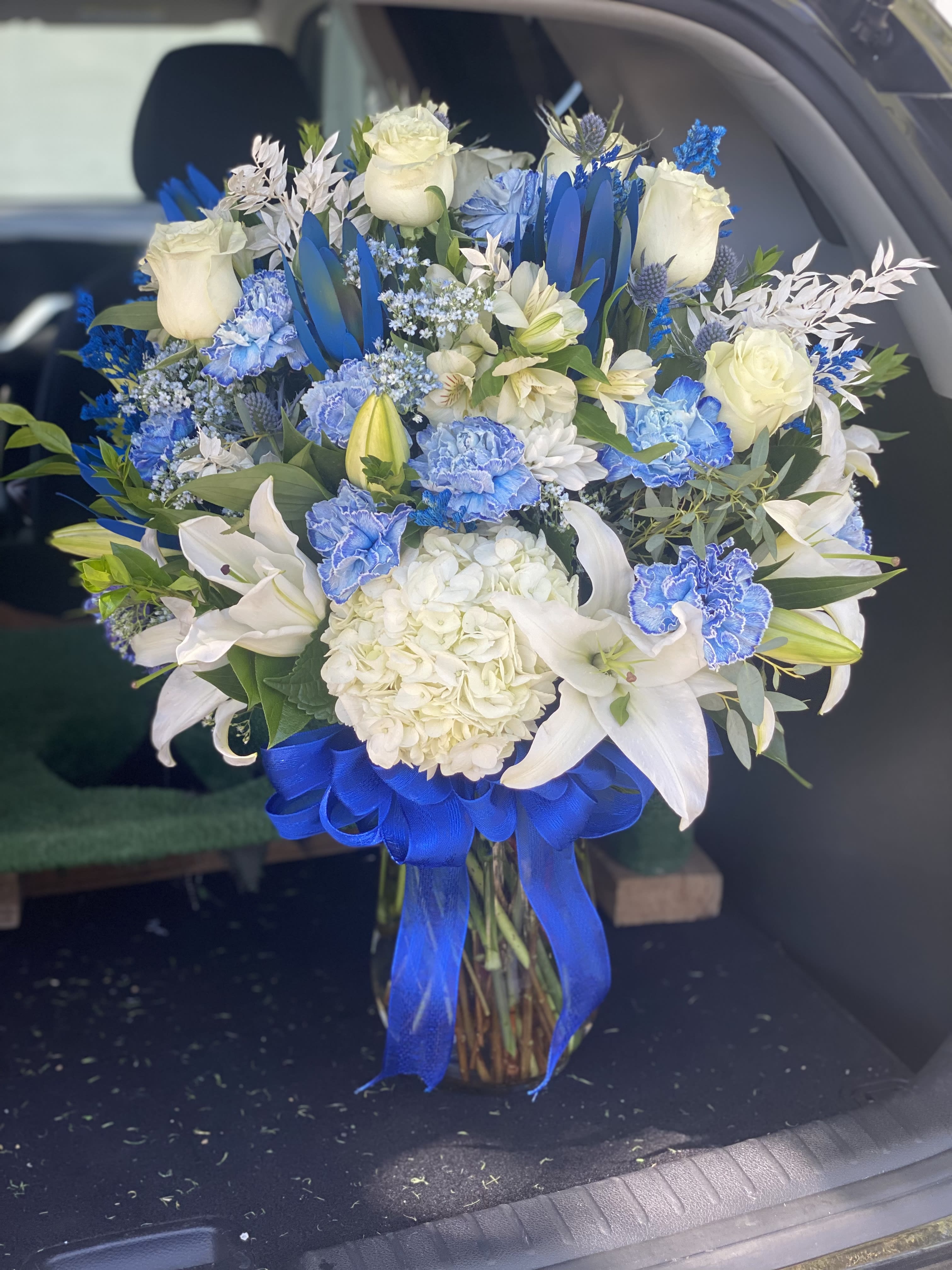 Glass Vase Mix Large - These include our every day flower mix.  Change in color request welcome.  Vase: 10” Tall.
