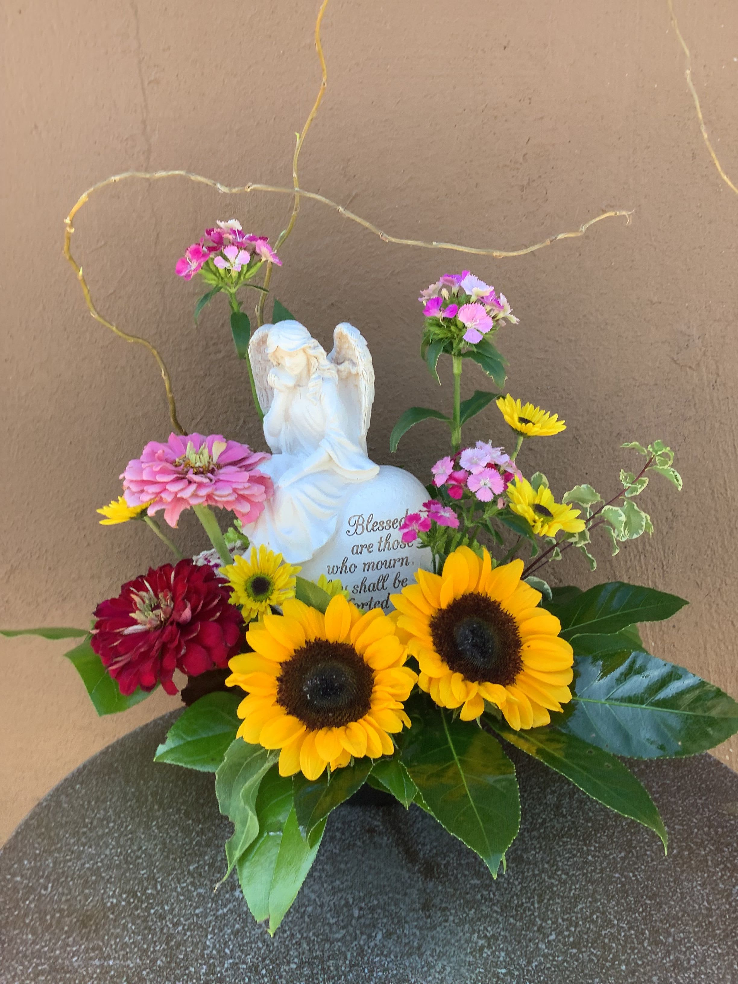 Blessed are those who mourn Blessed are those who mourn - This beautiful 8 inch statue with an angel that says “Blessed are those who mourn for they shall be comforted” is surrounded by summer garden flowers