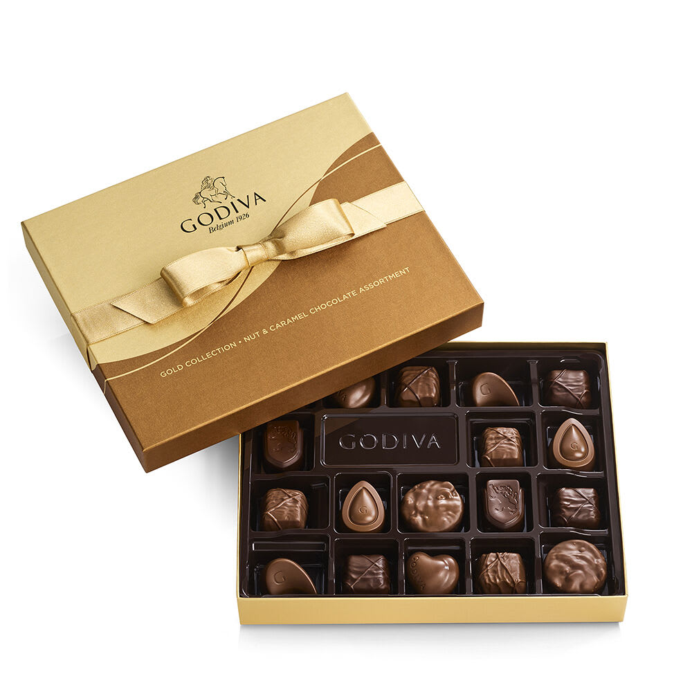 Godiva 18 pc. Nut & Caramel Premium chocolates Godiva 18 pc. Nut & Caramel Premium chocolates - Indulge in the exquisite flavors of the Premium Godiva Nut and Caramel Collection, now available at Watanabe Floral. This luxurious box features 18 pieces of Godiva's finest chocolates, each one a perfect blend of rich, velvety caramel and crunchy, flavorful nuts. Expertly crafted from the finest ingredients, these chocolates offer a decadent experience that’s both satisfying and memorable. Whether you’re treating yourself or gifting someone special, this collection is sure to delight. Key Features: Nut and Caramel Collection: A carefully curated selection of 18 chocolates featuring a variety of nut and caramel combinations. Premium Quality: Made with the finest ingredients for a truly indulgent experience. Perfect for Gifting: Ideal for any special occasion or as a luxurious treat for yourself. Elegant Packaging: Presented in a stylish box, perfect for gifting or sharing.