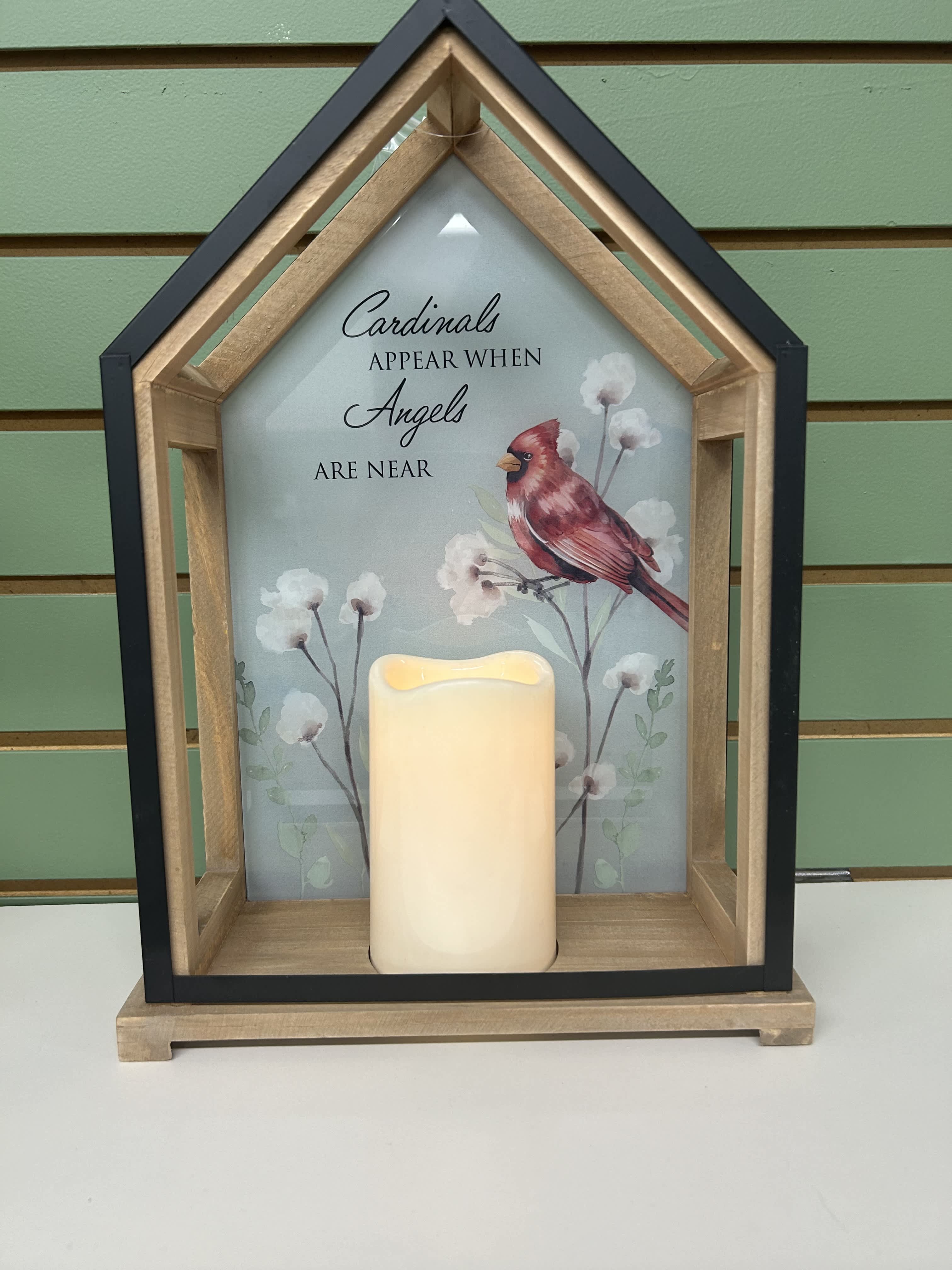 Cardinal Chapel Lantern - This one of a kind chapel shaped lantern features the phrase: Cardinals appear when angels are near. The Centered battery operated candle offers an illuminated glow with 3 AAA batteries that come included.