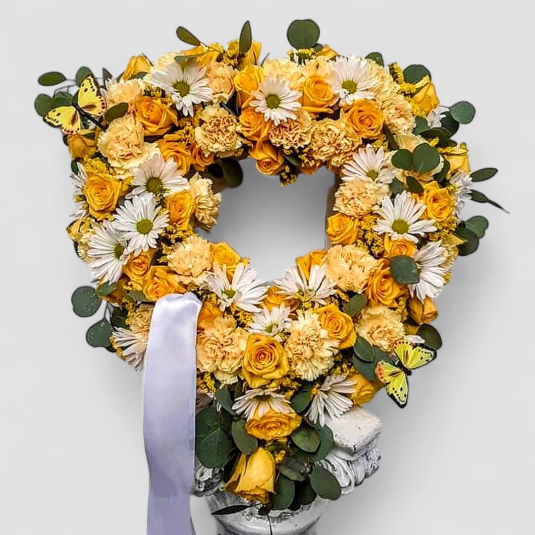 Yellow Sympathy Heart Tribute - Send this beautiful heart tribute in yellow and white to help them celebrate a life well lived. Roses and more to bring uplifting thoughts. 