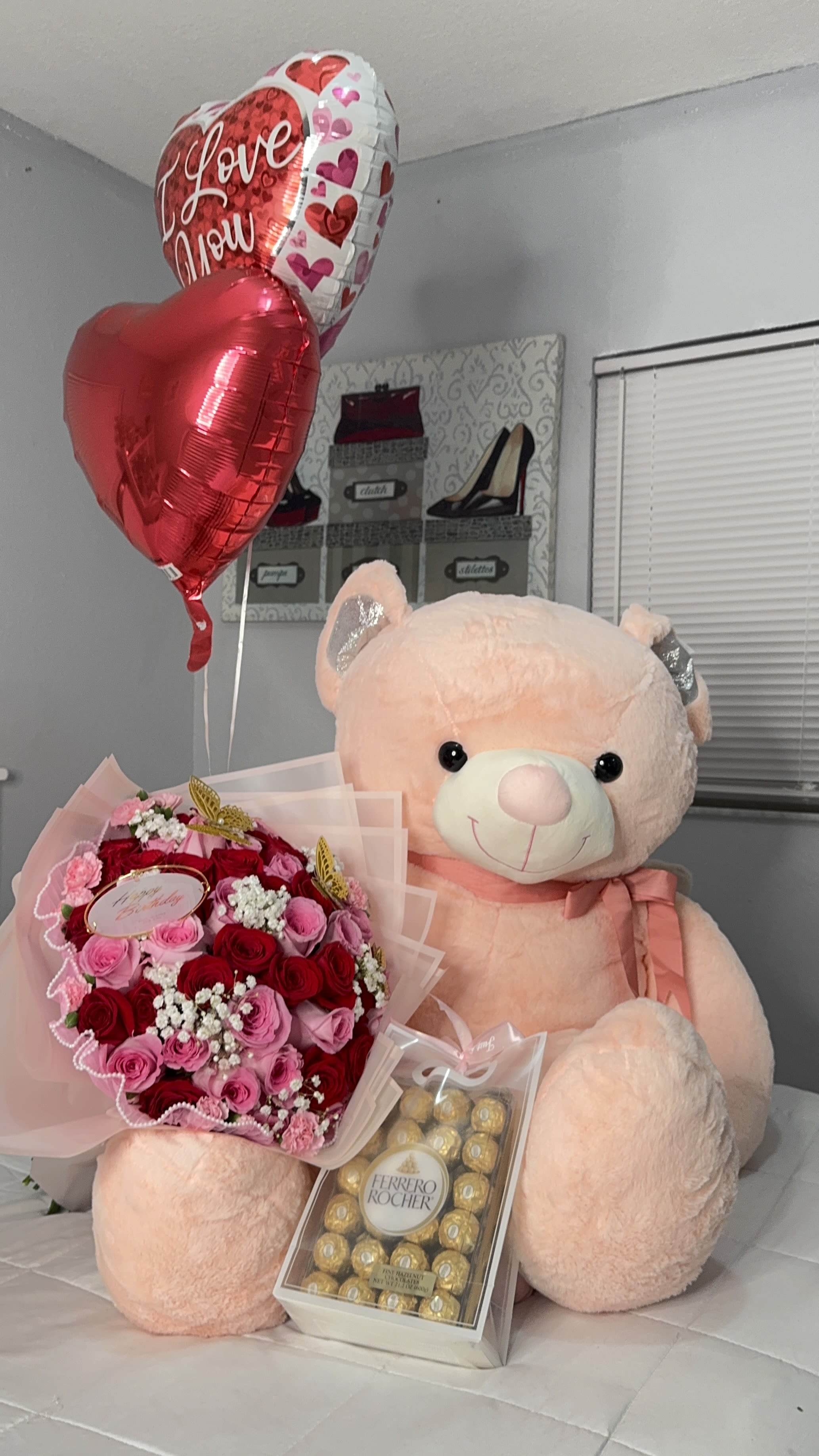Big Love Surprise - Make someone feel truly special with this unforgettable gift set! Includes:  An extra-large plush teddy bear  A stunning hand-wrapped bouquet roses with baby breath  A box of Ferrero Rocher chocolates  Three romantic helium balloons  NOTE:   CHOOSE YOUR ROSE COLOR: Red, pink, white, yellow, or mixed. CHOOSE YOUR TEDDY BEAR COLOR: White, pink, or light brown.  