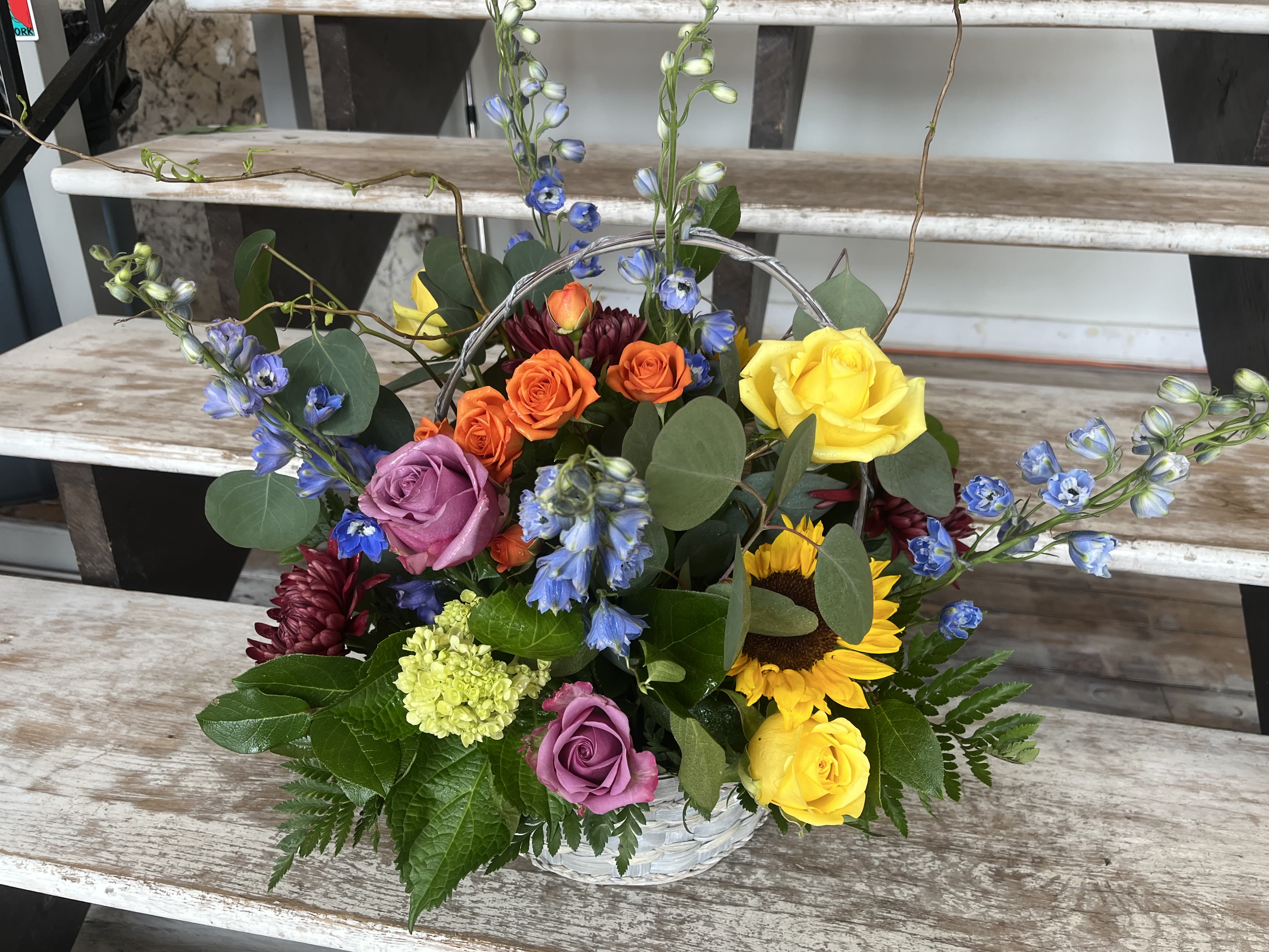 The Martha - For the color lover in your life! Featuring a variety of flowers, this arrangement is a bright beauty. Send it to celebrate the summer season or for birthdays.  
