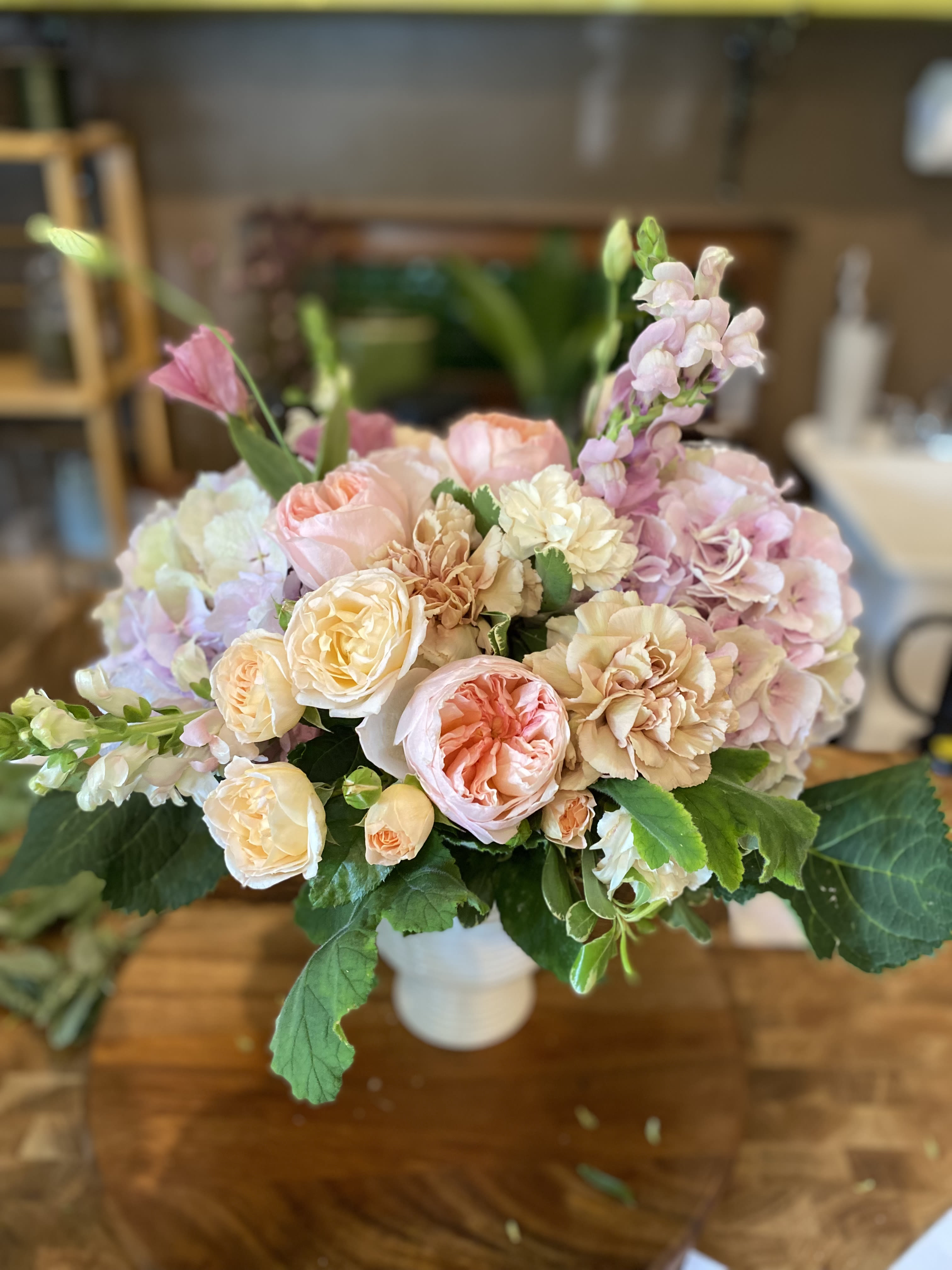 Spring Romance Spring Romance - Seasonal luxury blooms in a pink and white palette to brighten someone’s special day.