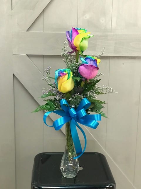 Feeling Groovy! Feeling Groovy! - These brightly colored tye dye roses are sure to put a smile on the face of whom ever receives them.