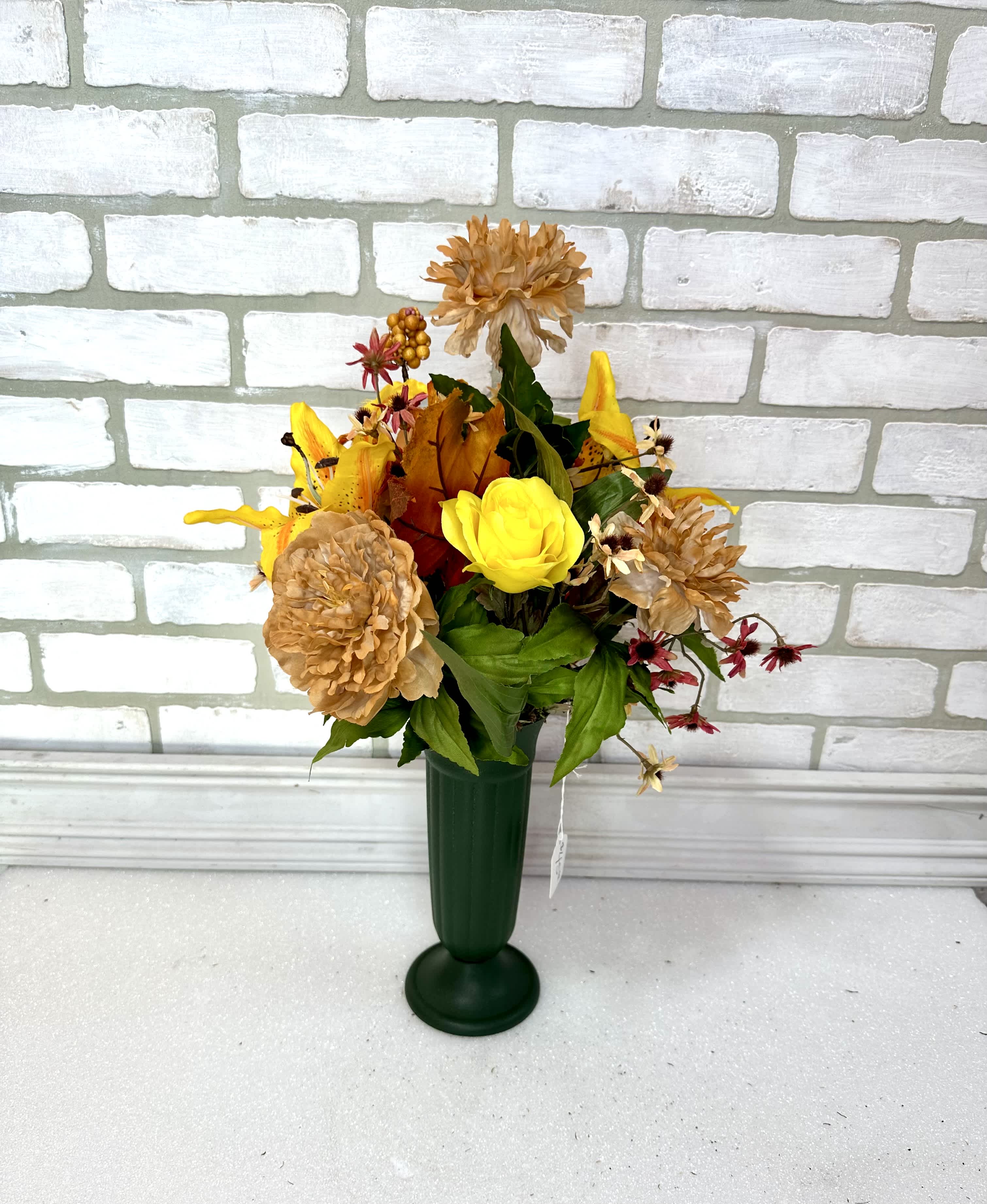 Silk Fall Cemetery Cone - A mix of artificial fall flowers in a cone that can be displayed by a grave. 