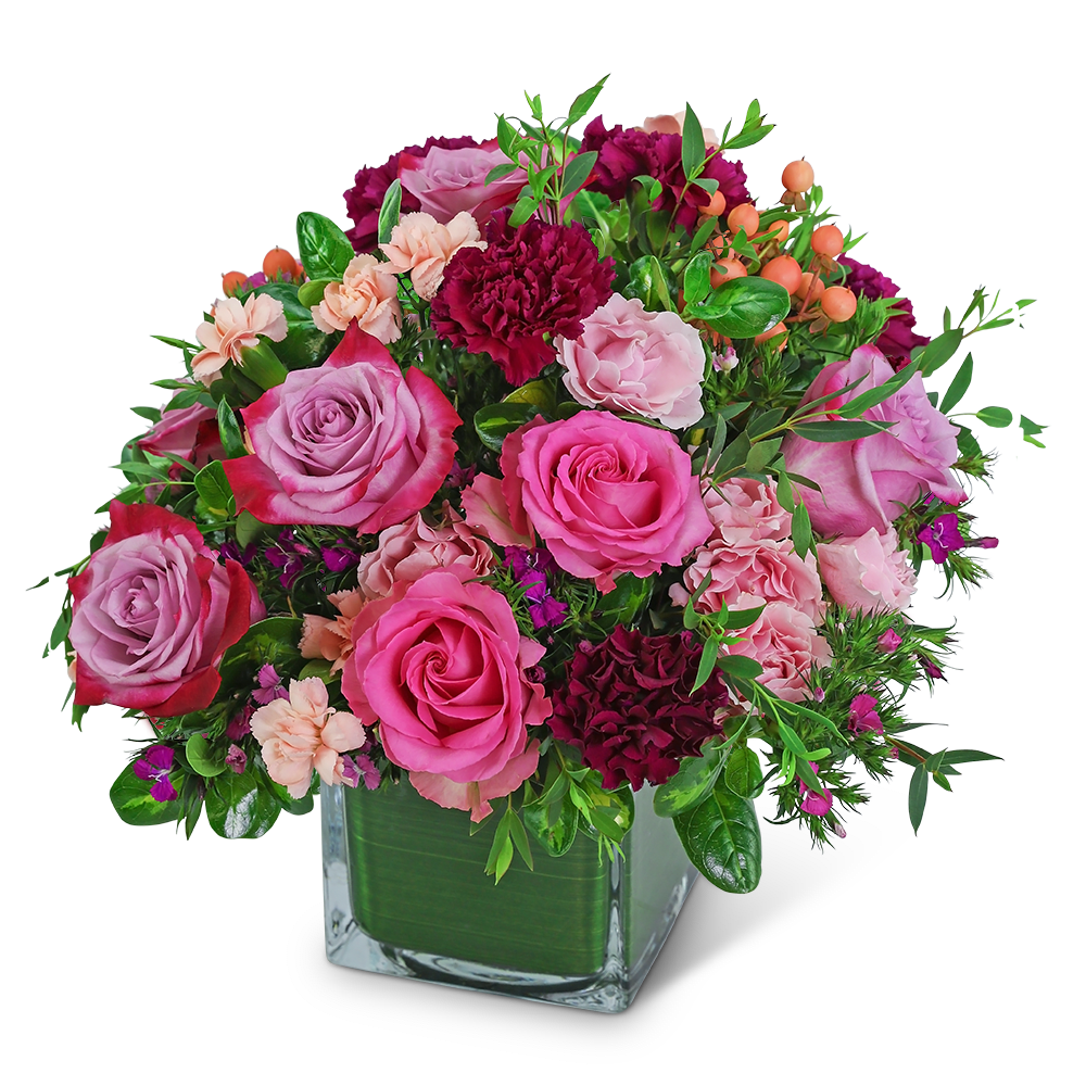 Ethereal Rose Garden - Surprise your loved one with this light and airy, romantic floral design. Ethereal Rose Garden includes roses, carnations, hypericum berries, and assorted foliage in a leaf-lined vase. Pick the perfect color and design that matches your recipient's unique personality. This is the perfect gift for an Anniversary, birthday, or just because! We offer local flower delivery with the freshest flowers and the best customer service.
