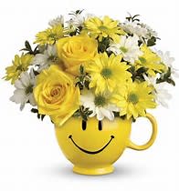 Be Happy Bouquet - When you're looking to make someone smile, this happy face mug of roses and daisies is tops. Sure to cheer up everyone from a beloved wife to a busy boss, these are also great flowers for kids.