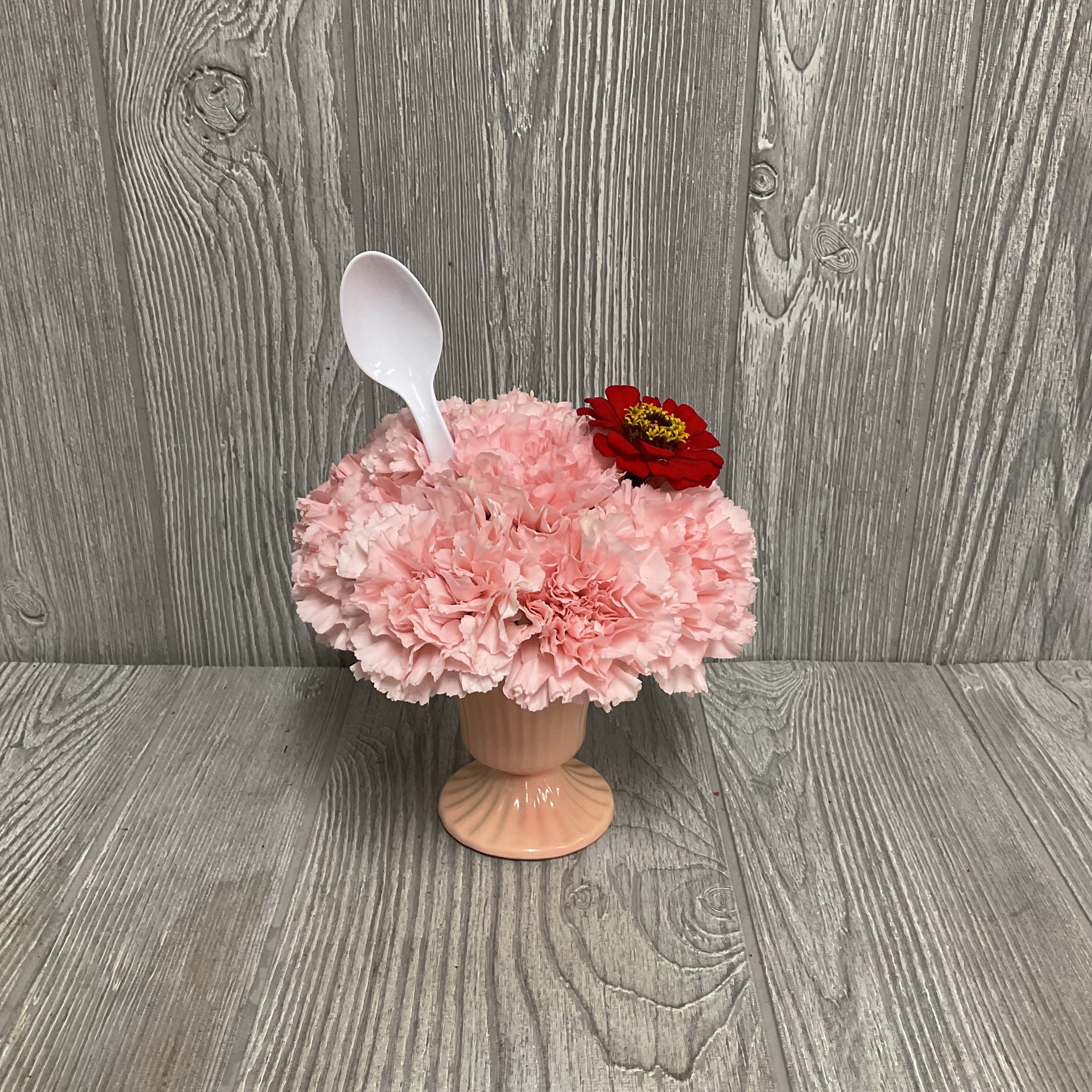 We all scream for ice cream! - Send the look of a delicious bowl of ice cream, but without the melting! Perfect arrangement to welcome the heat. Flowers and colors may vary. 