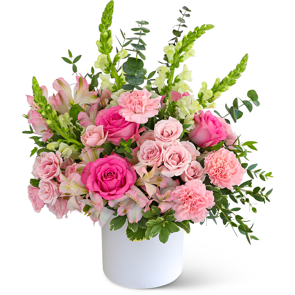 Pink Paradise - Pink Paradise is a contemporary flower design that combines roses, alstroemeria, Snapdragons, and carnations surrounded by a variety of foliage. This soft pink design is the perfect gift for an anniversary, birthday, or New baby gift! We offer local flower delivery and many consider us the best local florist. Whether you order online or give us a call if you want to speak to one of our floral experts, we’re ready to listen to your story, craft a beautiful bouquet, and expertly deliver it to your loved one.