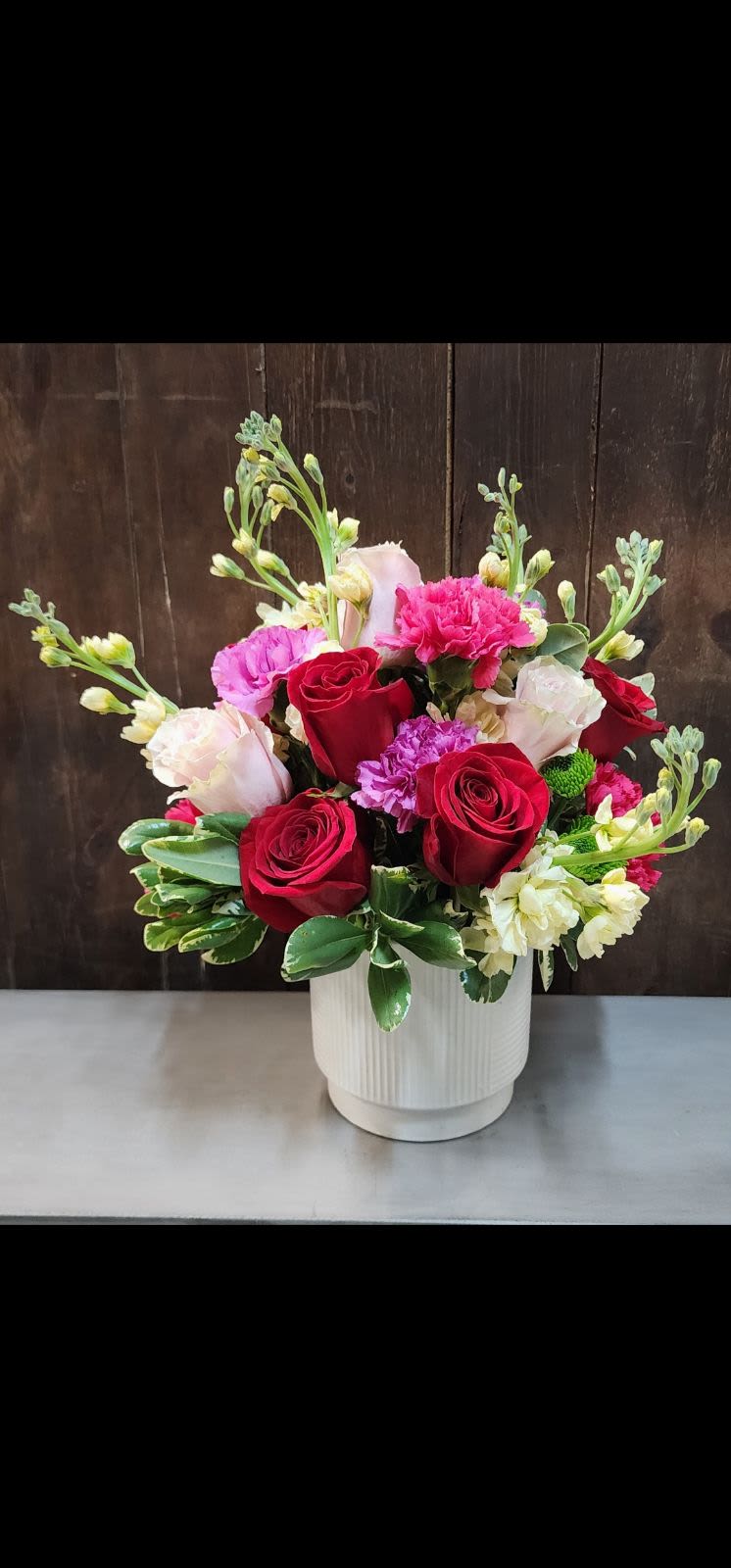 Everyday love - Introducing the 'Adeline' bouquet, a harmonious blend of roses and carnations in delightful shades of pink, artfully arranged with lush greenery in a charming ceramic container. This enchanting creation is the perfect gift, destined to bring joy and a radiant smile to the faces of beloved moms or grandmas, sisters,  and anyone you love really! :)