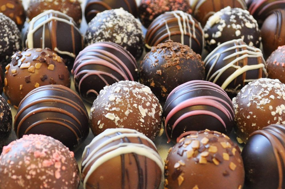 Box of Assorted Truffles Box of Assorted Truffles - Beautifully wrapped box of 6 delicious gourmet truffles. Perfect gift to sweeten anyone's day.