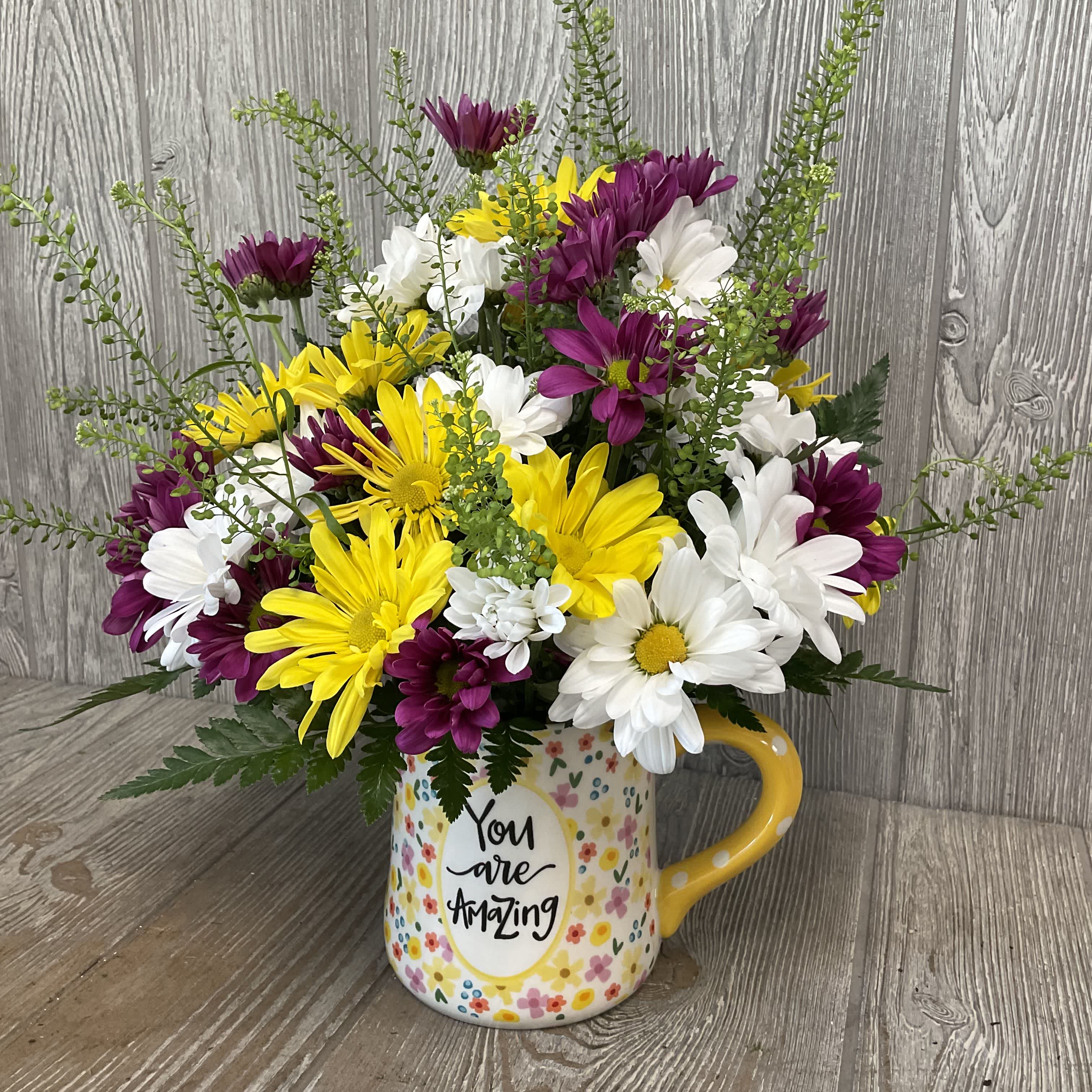 You Are Amazing - Purple and yellow arrangement in a bright and cheerful mug. 